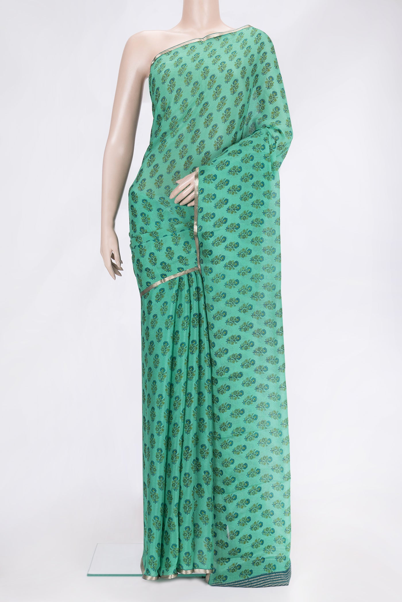 Sea Green Dual Tone Mysore Chiffon Saree with Printed design on the body and Zari Border.  displayed on a mannequin