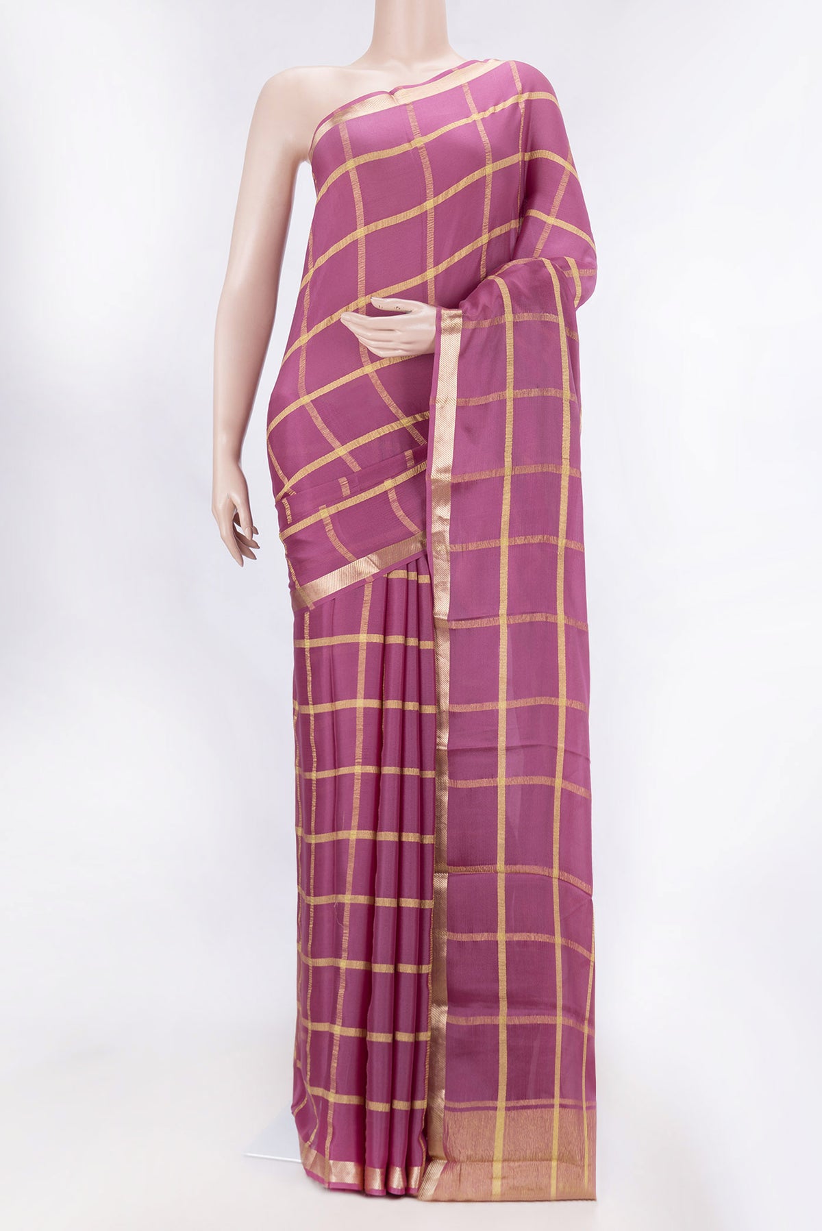 Light Magenta Mysore Crepe Saree with Checked design on the body and Zari Border displayed on a mannequin