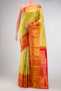 Parrot Green Dual Tone Kanjivaram Silk Saree with Zari Brocade on the body and Zari Border.  displayed on a mannequin