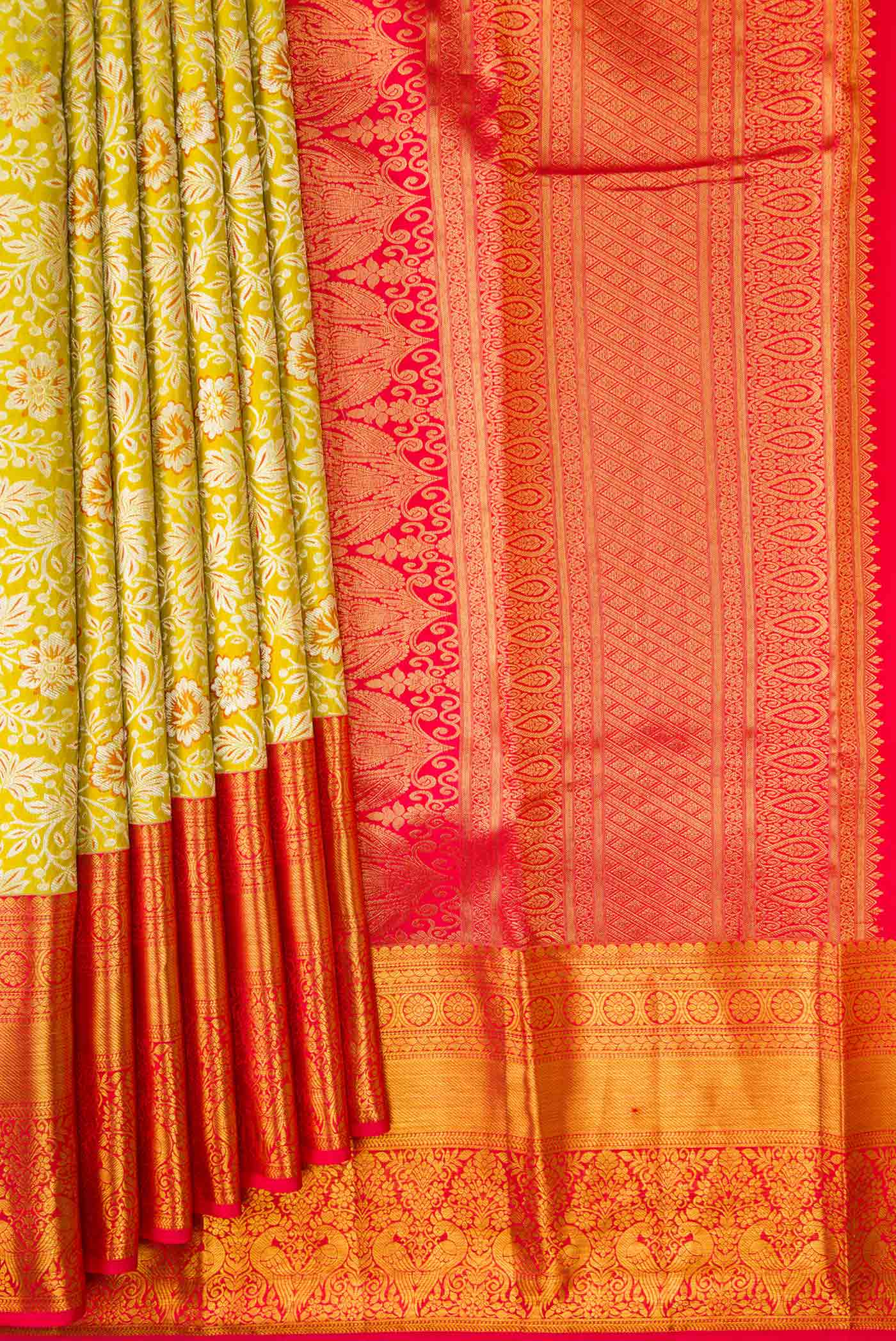 Pleats and pallu of Parrot Green Dual Tone Kanjivaram Silk Saree with Zari Brocade on the body and Zari Border. 