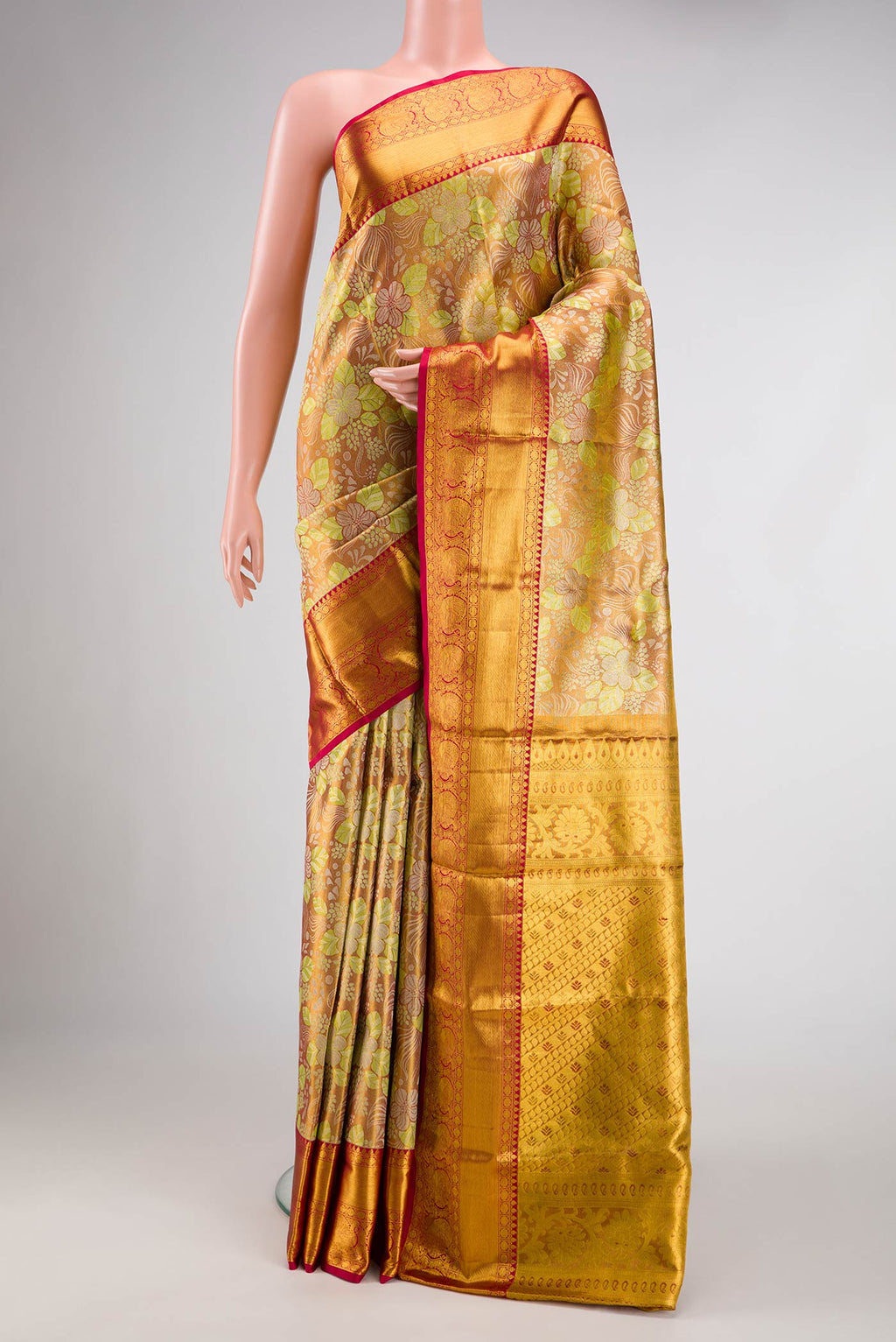 Gold Dual Tone Kanjivaram Tissue Silk Saree with Zari Brocade on the body and Zari Border.  displayed on a mannequin