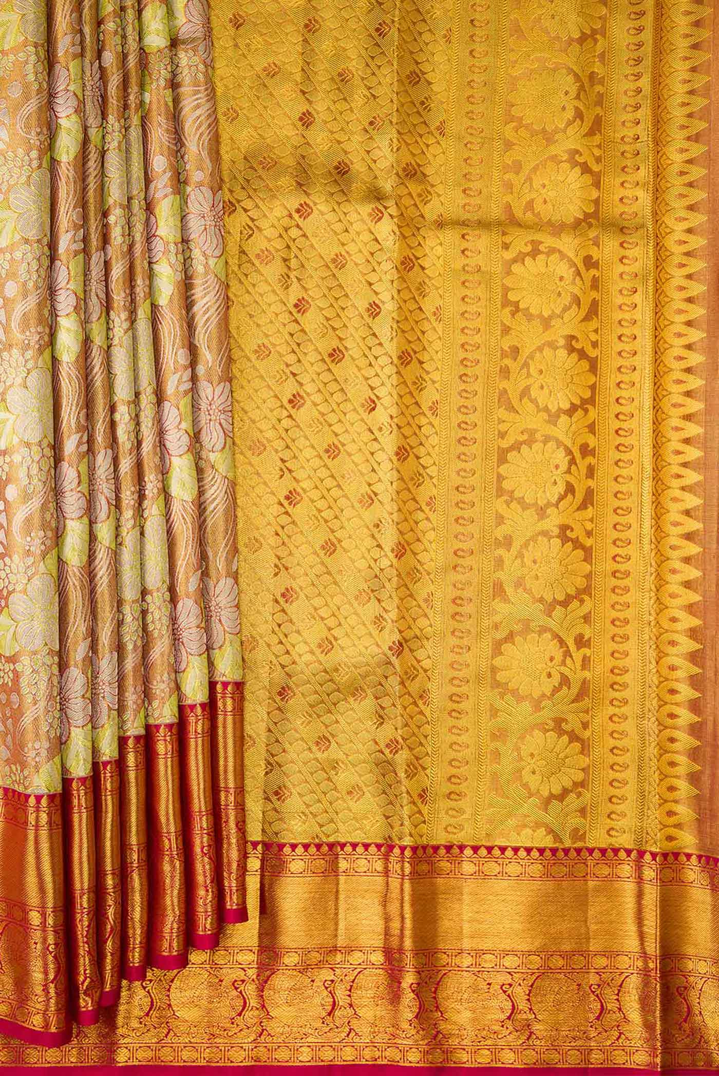 Pleats and pallu of Gold Dual Tone Kanjivaram Tissue Silk Saree with Zari Brocade on the body and Zari Border. 