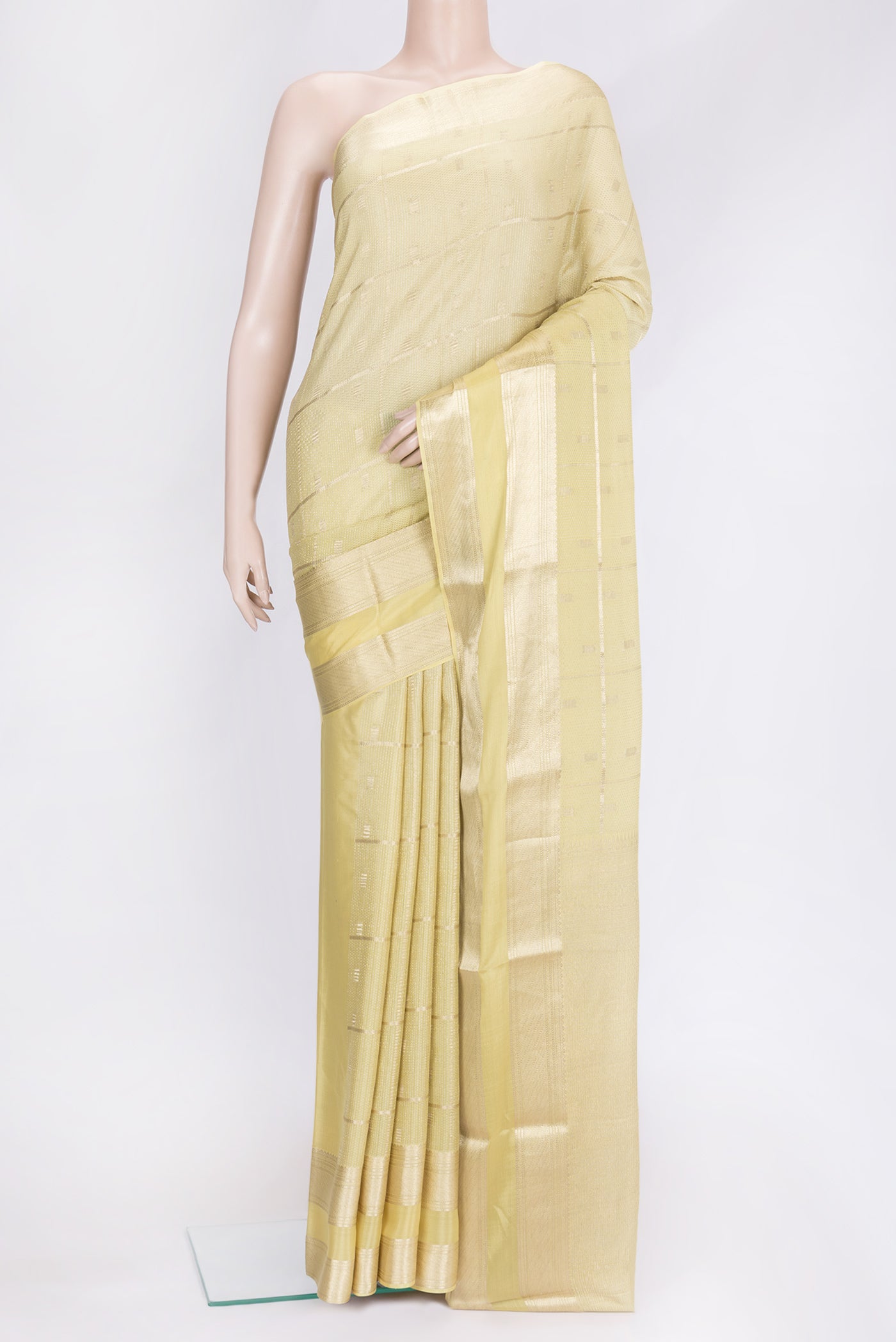 Sandal Dual Tone Mysore Silk Saree with Zari Brocade on the body and Zari Border.  displayed on a mannequin
