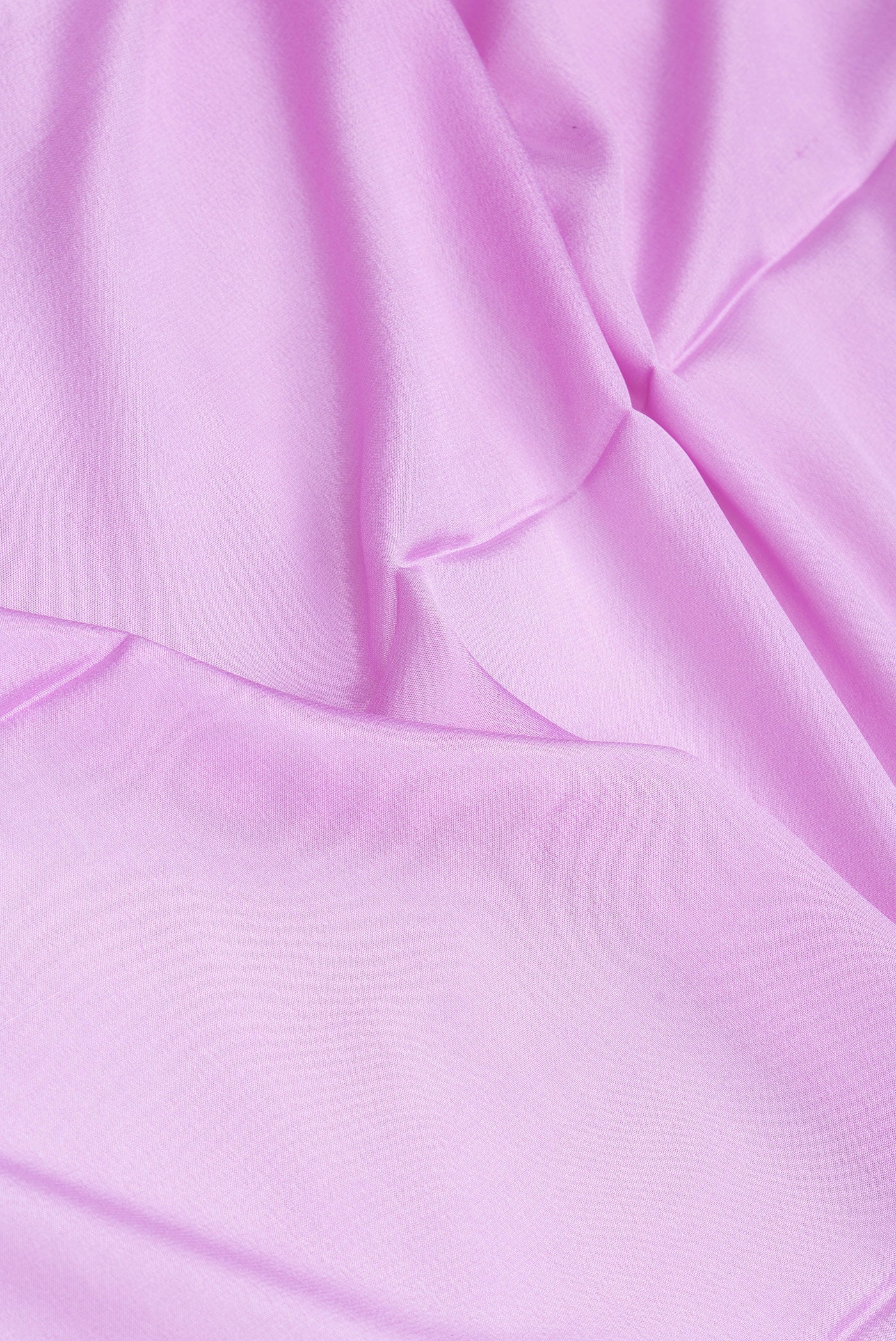 Close up of Lavender Mysore Crepe Saree with Plain Body and Embroidery Border.  displaying folds
