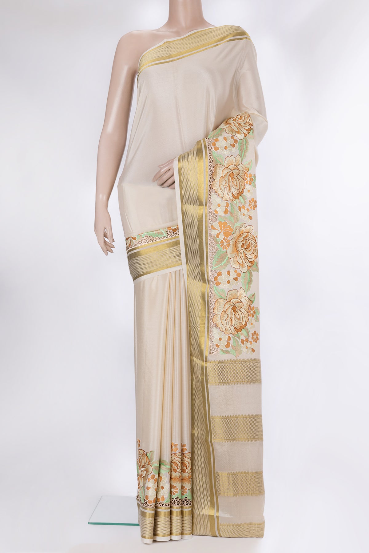 Cream Mysore Crepe Saree with Plain Body and Embroidery Border.  displayed on a mannequin