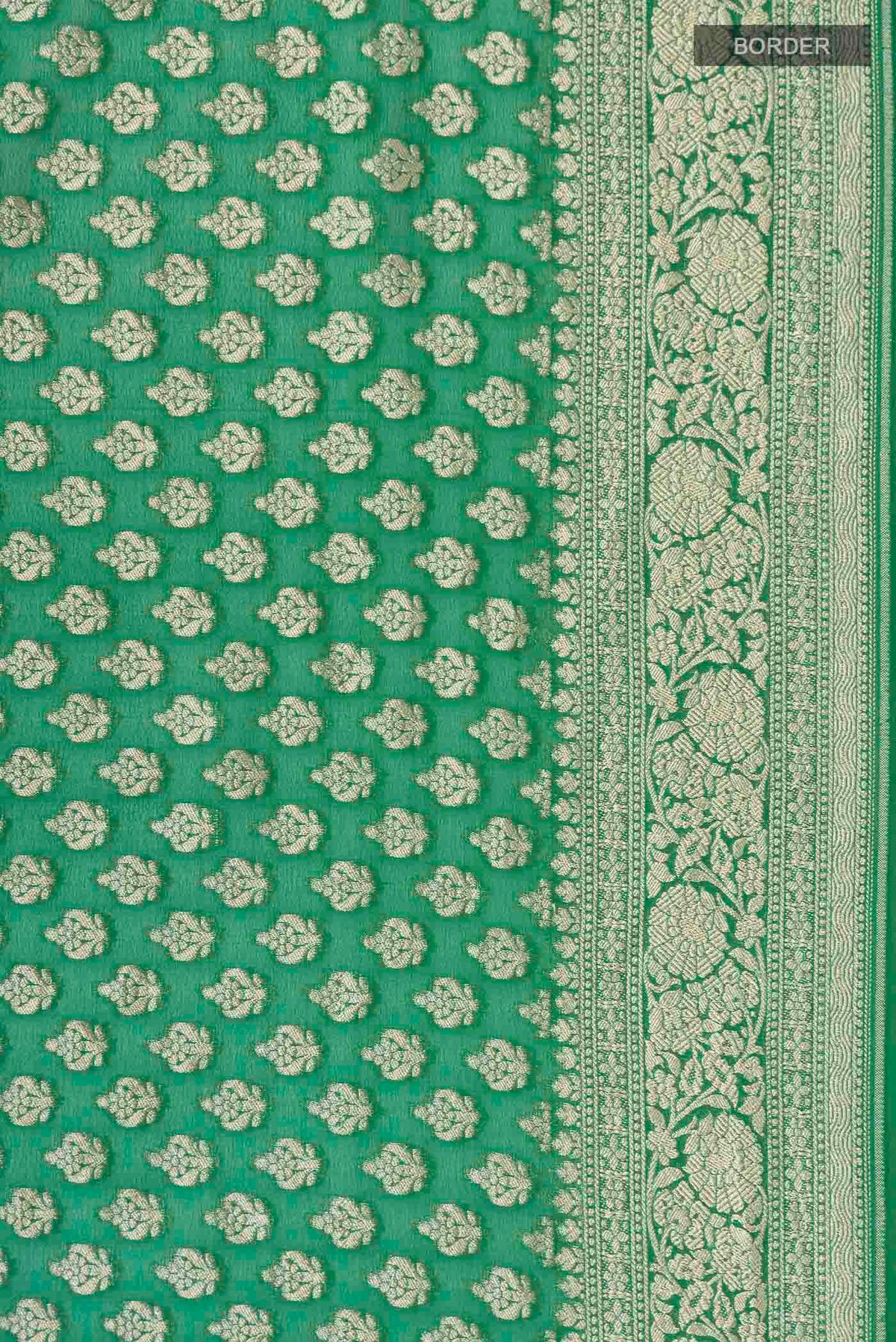 Border image of Green Banarasi Georgette Saree with Zari Butta on the body and Zari Border