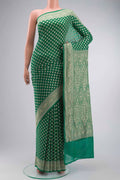 Green Banarasi Georgette Saree with Zari Butta on the body and Zari Border displayed on a mannequin