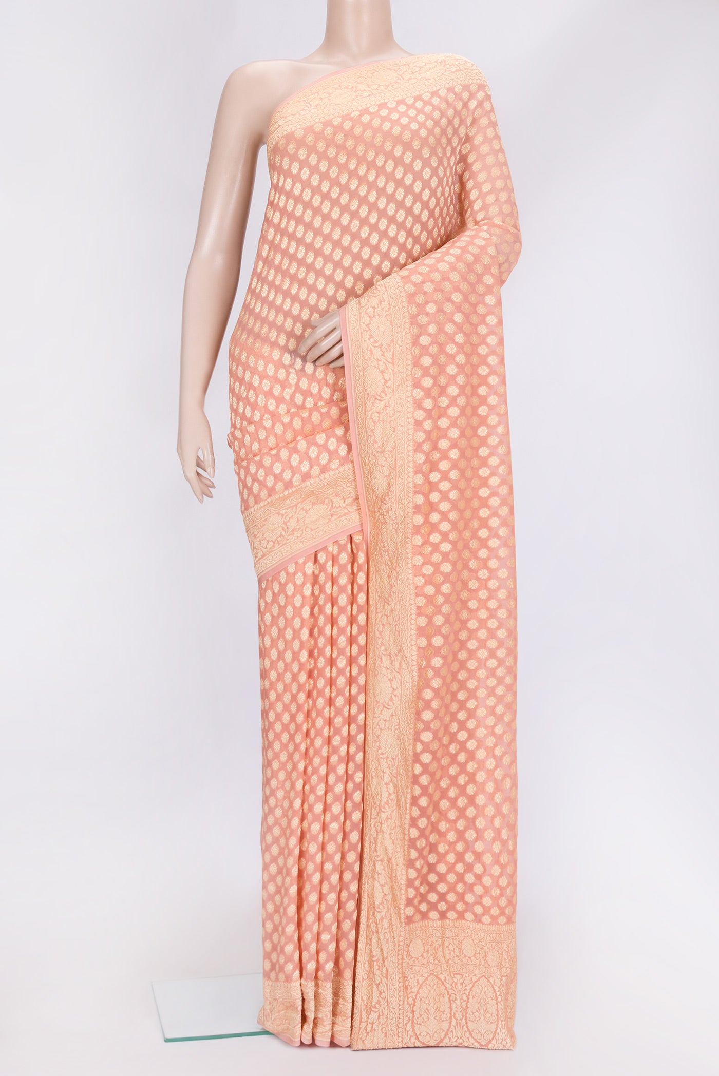 Golden Peach Dual Tone Banarasi Georgette Saree with Zari Brocade on the body and Zari Border.  displayed on a mannequin