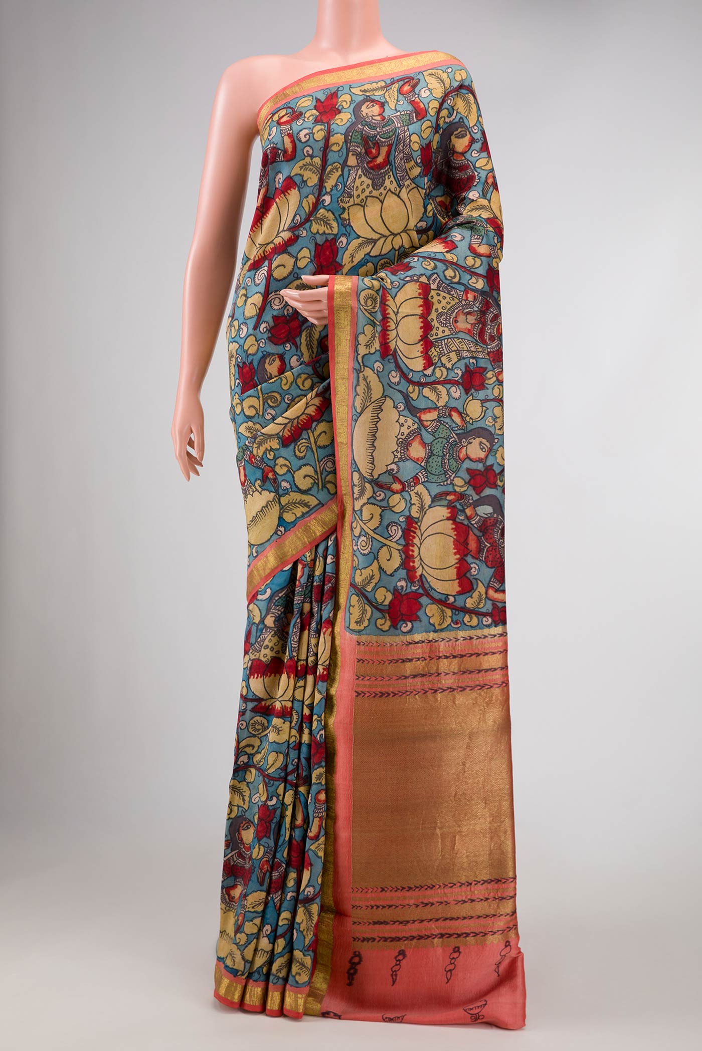 Blue Dual Tone Kanjivaram Silk Saree with kalamkari Print on the body and Zari Border.  displayed on a mannequin