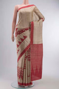 Beige Bhagalpuri Tussar Silk Saree with Printed design on the body and Embroidery Border displayed on a mannequin