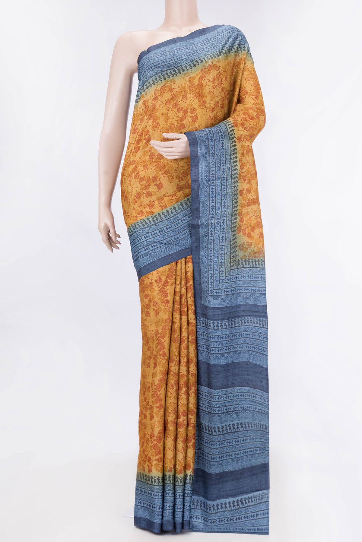 Mustard Dual Tone Tussar Silk SareePrinted design on the body and Printed Border displayed on a mannequin