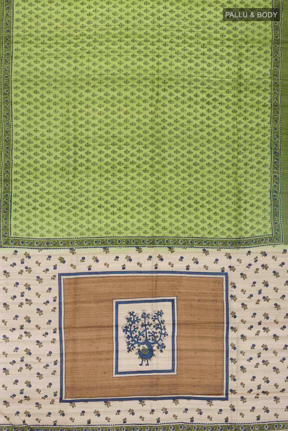 Flat view of Green Tussar Silk Saree with Printed design on the body and Plain Border