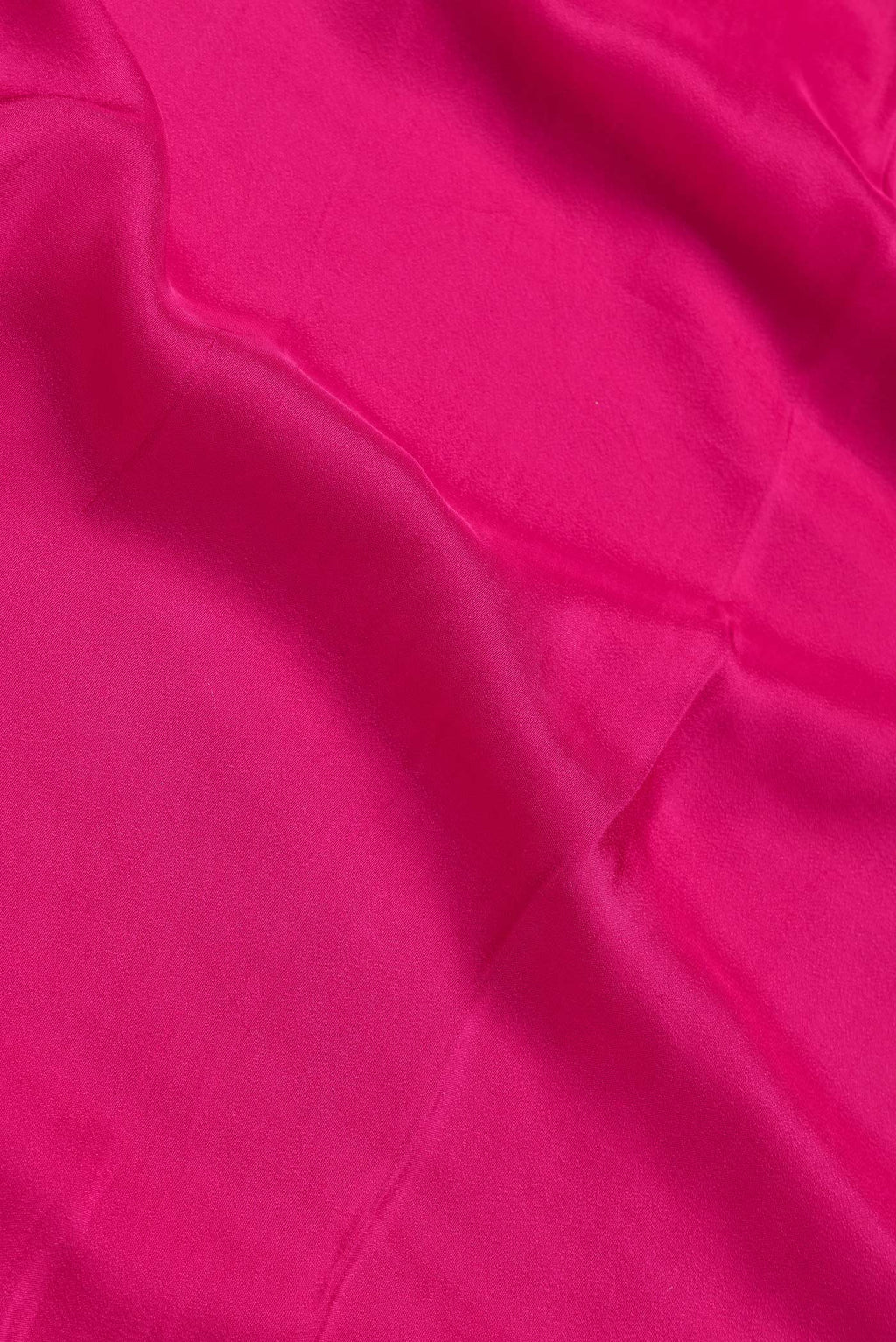 Close up of Pink Dual Tone Satin Crepe Saree with Plain Body and Sequin Border.  displaying folds