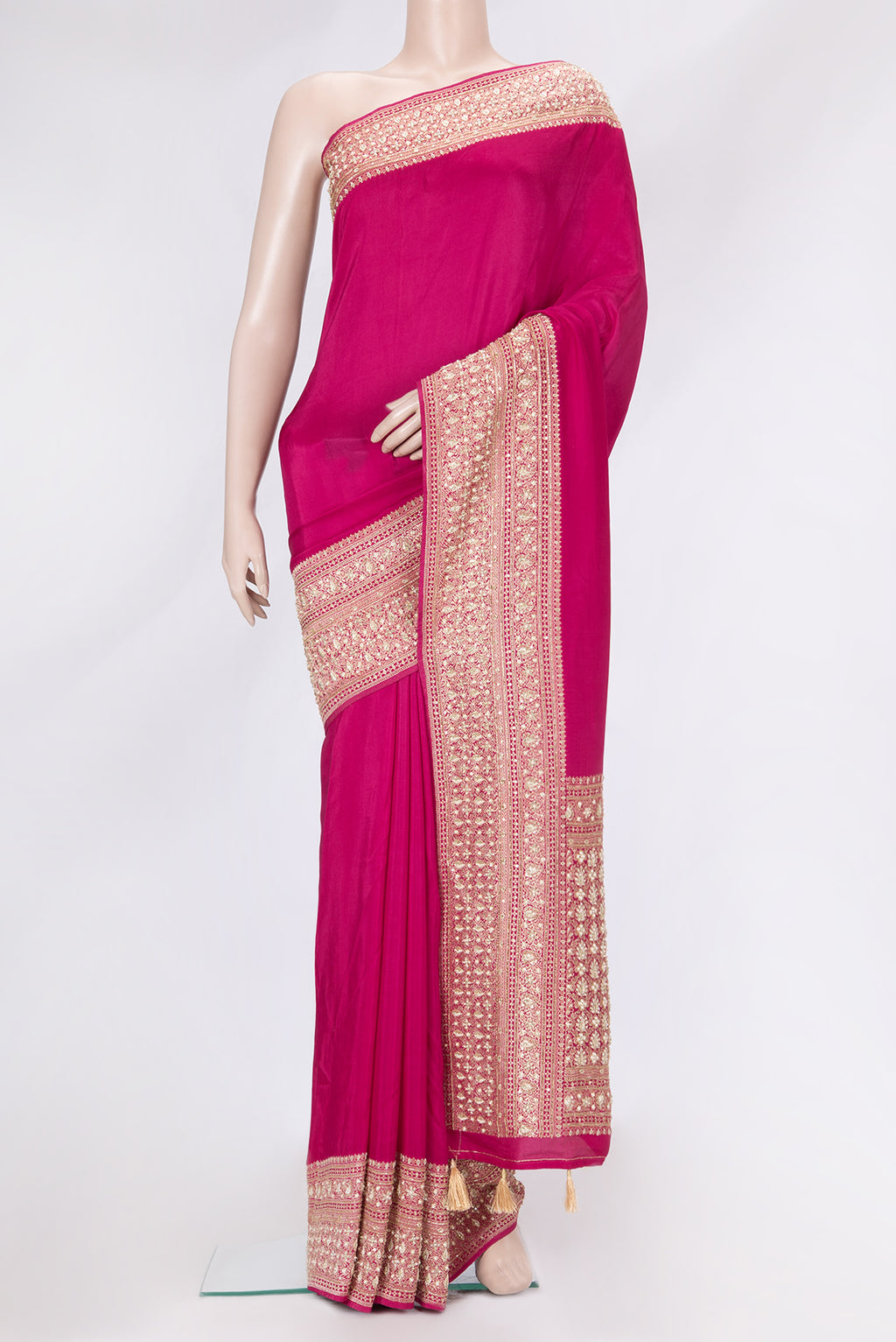 Pink Dual Tone Satin Crepe Saree with Plain Body and Sequin Border.  displayed on a mannequin