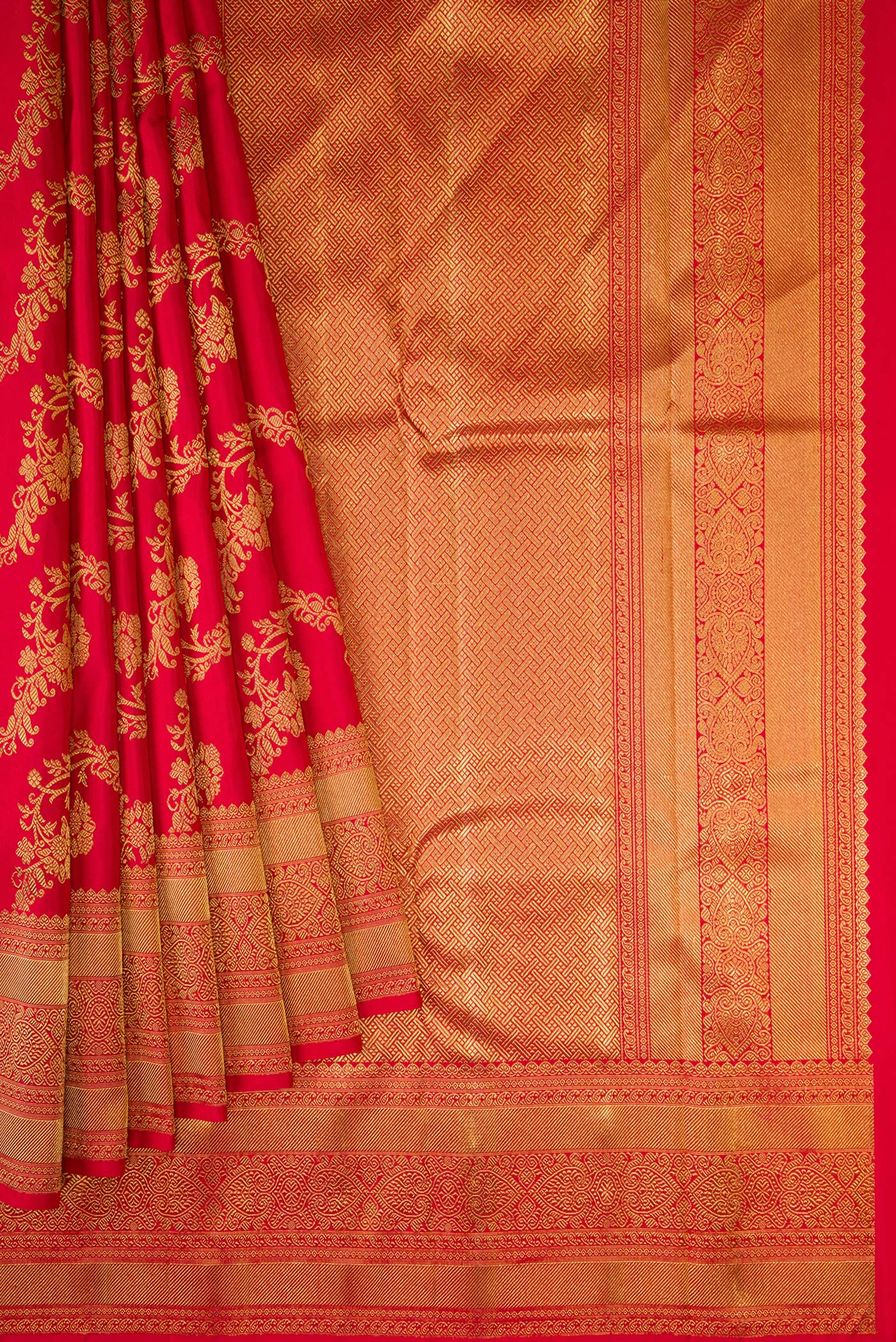 Pleats and pallu of Pure Silk Pure Zari Red Dual Tone Kanjivaram Saree with Zari Brocade on the body and Zari Border. 