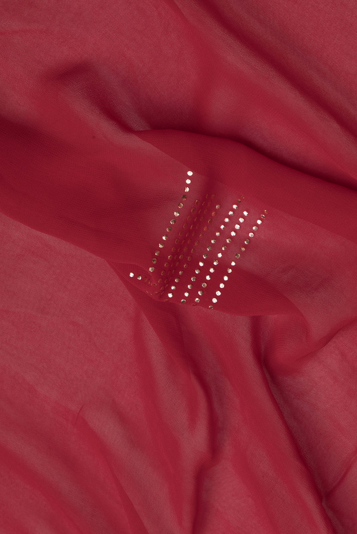 Close up of Red Dual Tone Mysore Georgette Saree with Embroidery on the body and Fancy Border.  displaying folds