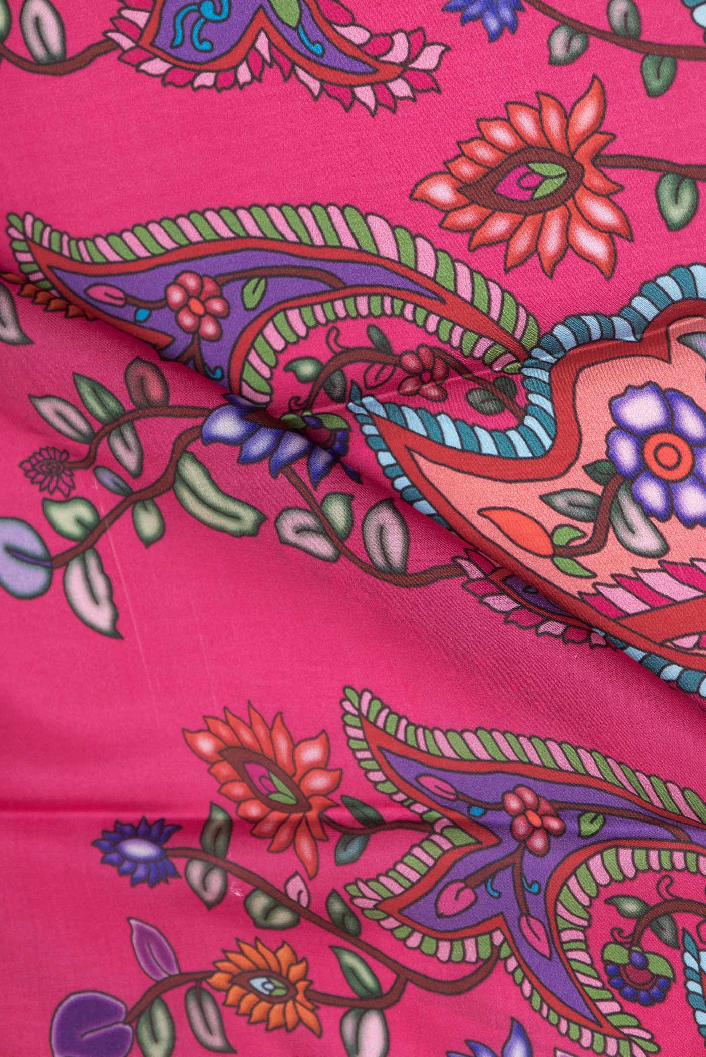 Close up of Pink Dual Tone Mysore Crepe Saree with Printed design on the body and Zari Border displaying folds