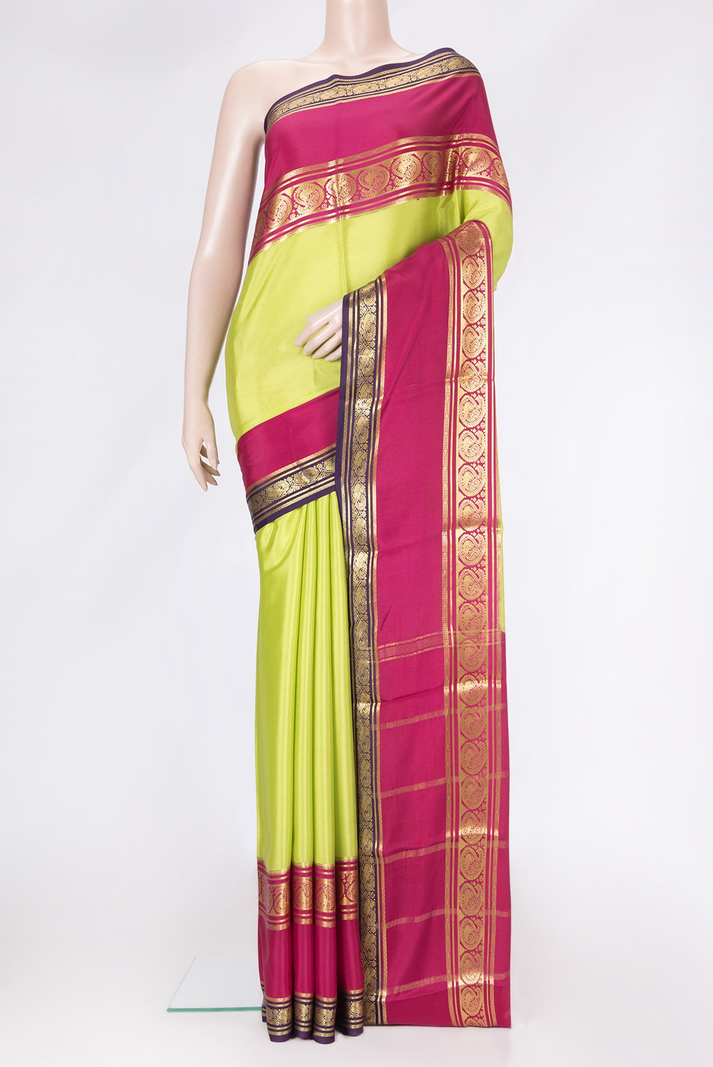 Parrot Green Dual Tone Mysore Silk Saree with Plain Body and Zari Border.  displayed on a mannequin