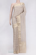 Beige Dual Tone Mysore Georgette Saree with Zari Brocade on the body and Zari Border.  displayed on a mannequin