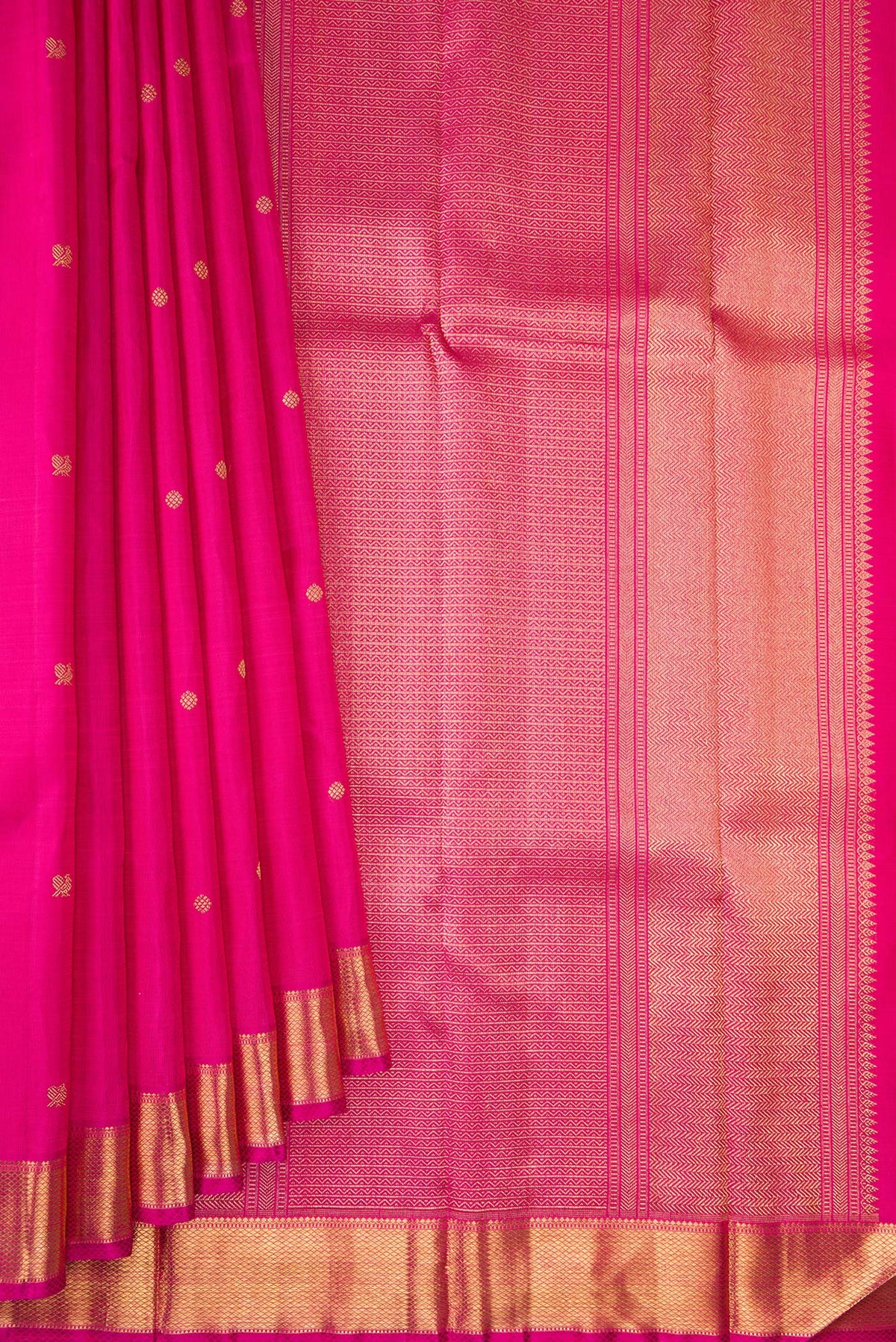 Pleats and pallu of Pure Silk Pure Zari Pink Kanjivaram Saree with Zari Butta on the body and Zari Border. 