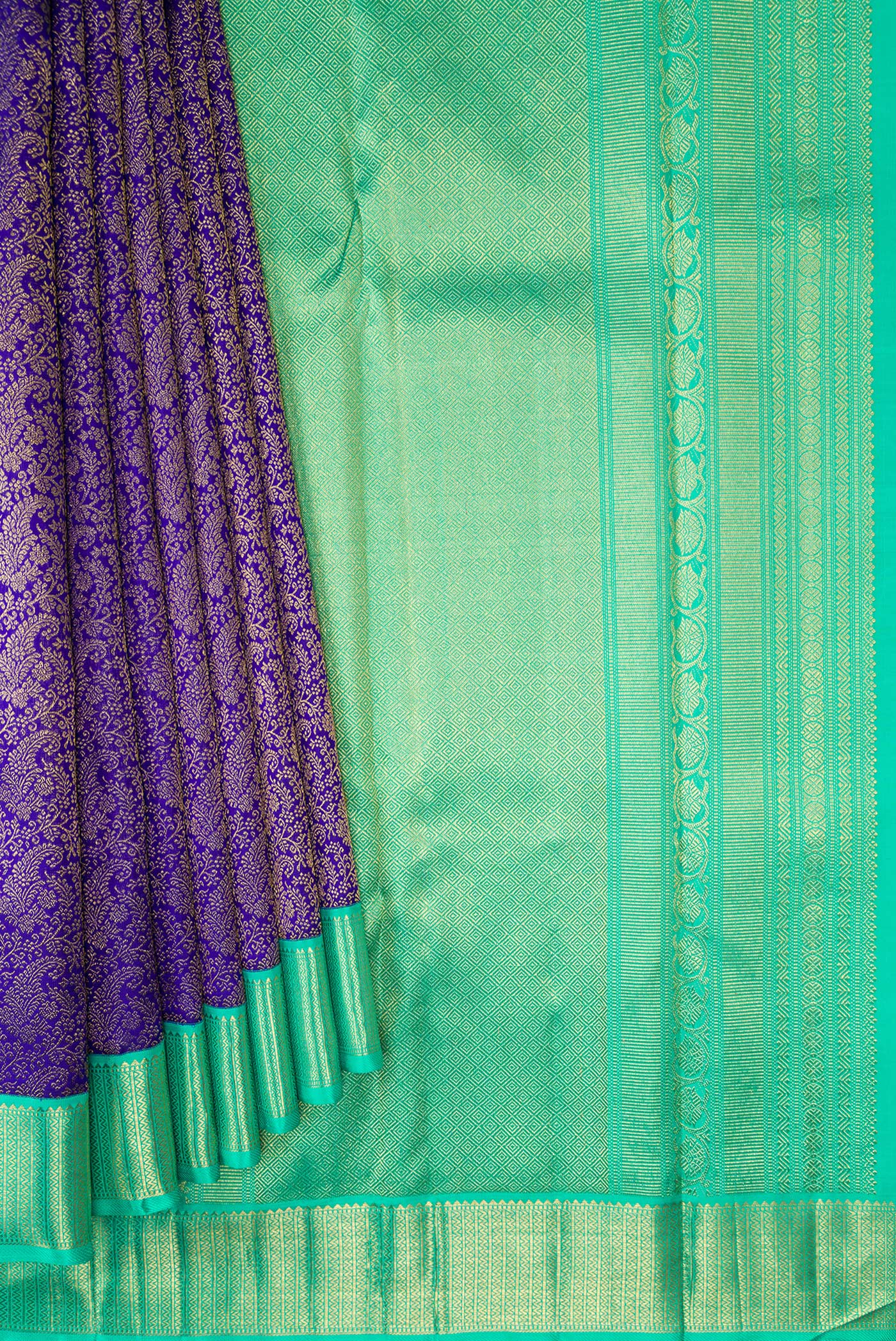 Pleats and pallu of Pure Silk Pure Zari Royal Blue Dual Tone Kanjivaram Saree with Zari Brocade on the body and Zari Border. 