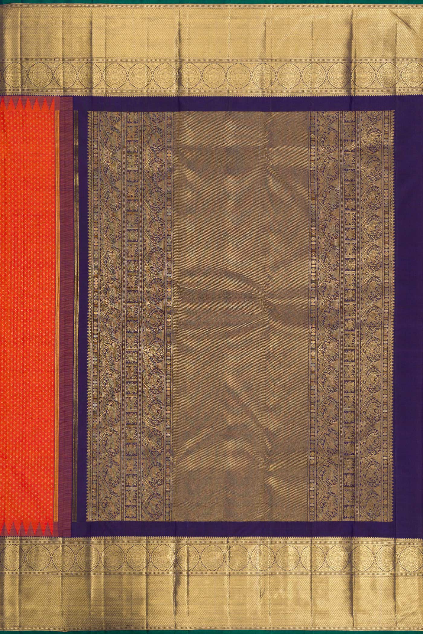 Close up image of the pallu of Pure Silk Pure Zari Orange Dual Tone Kanjivaram Saree with Zari Brocade on the body and Zari Border. 