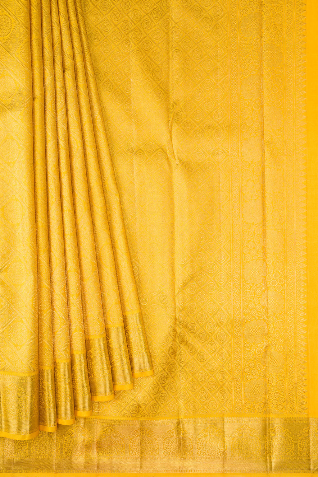 Pleats and pallu of Yellow Dual Tone Kanjivaram Silk Saree with Zari Brocade on the body and Zari Border. 