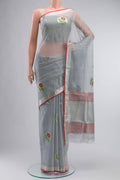 Grey Kota Silk Saree with Zari And Thread Butta on the body and Zari Border displayed on a mannequin