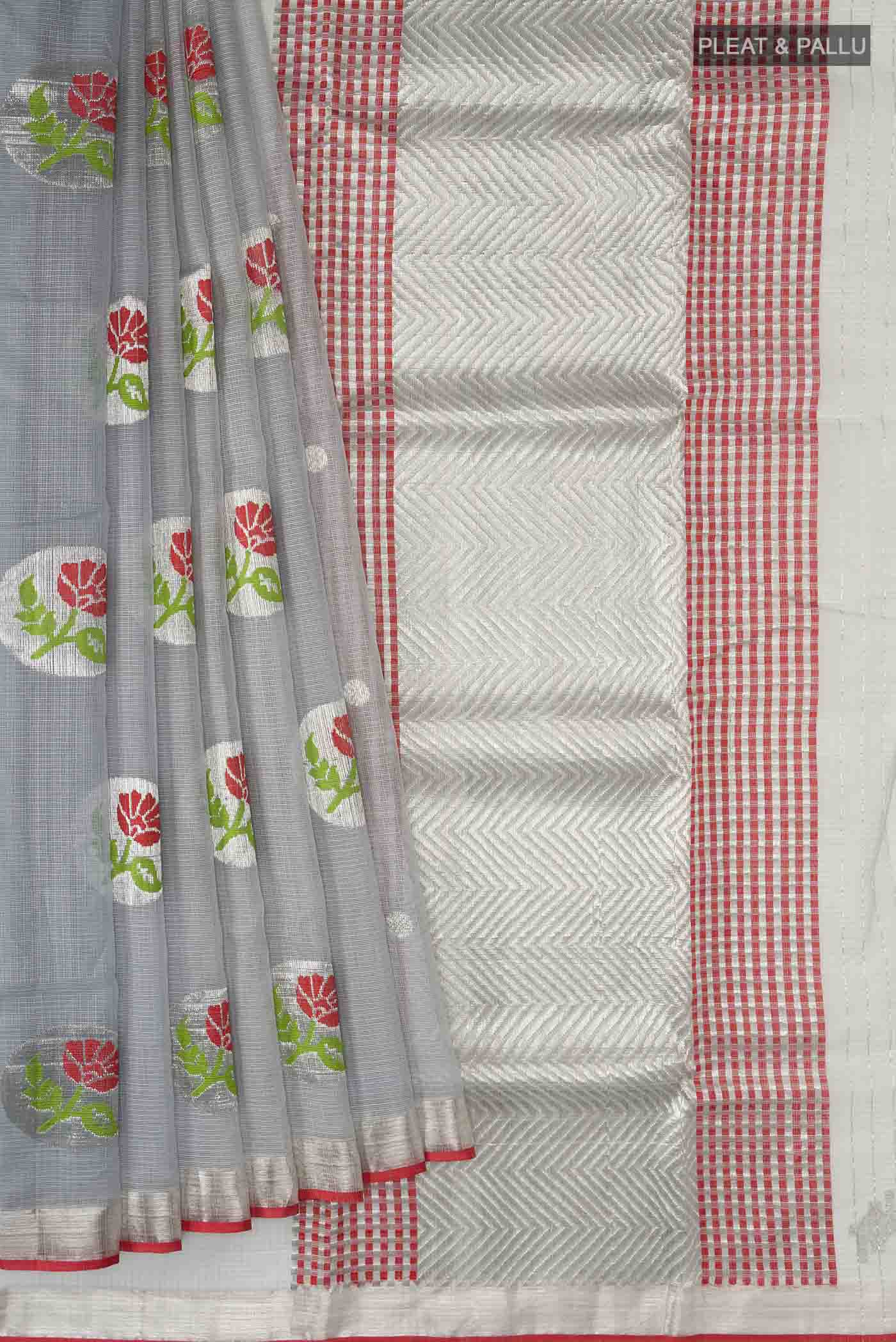 Pleats and pallu of Grey Kota Silk Saree with Zari And Thread Butta on the body and Zari Border