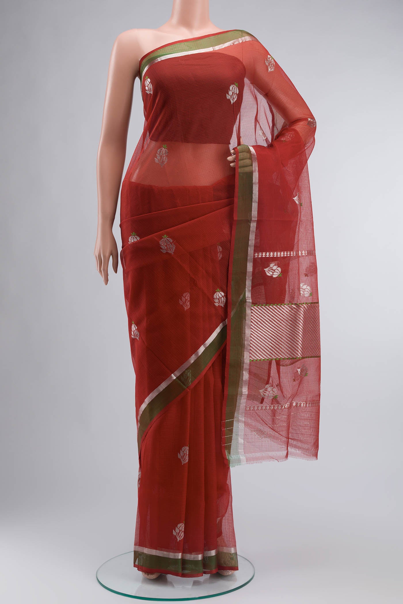Maroon Kota Silk Saree with Zari And Thread Butta on the body and Zari Border displayed on a mannequin