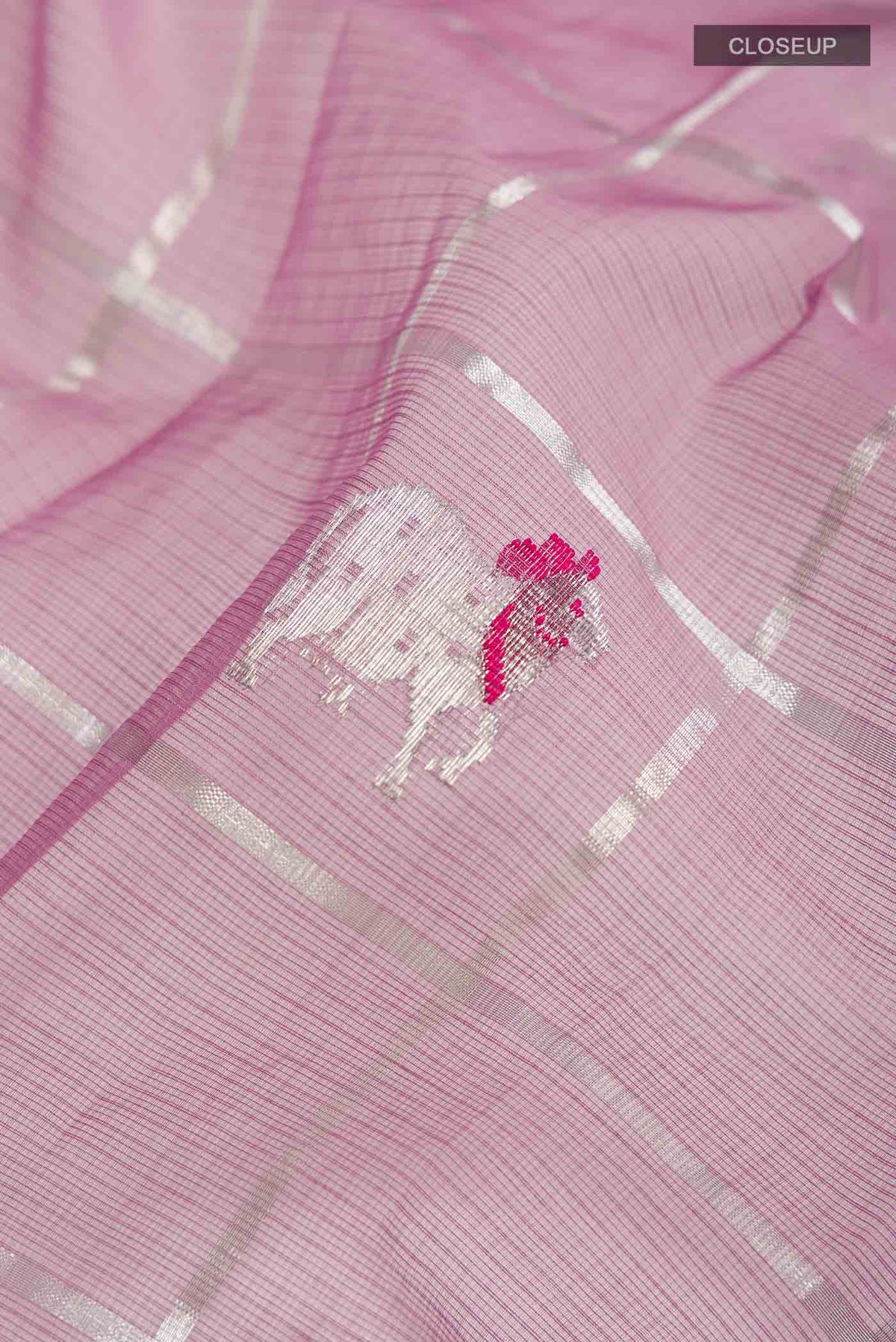 Close up of Lavender Kota Silk Saree with Zari And Thread Butta on the body and Zari Border displaying folds