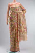 Peach Kota Silk Saree with Jacquard With Zari Butta on the body and Zari Border displayed on a mannequin