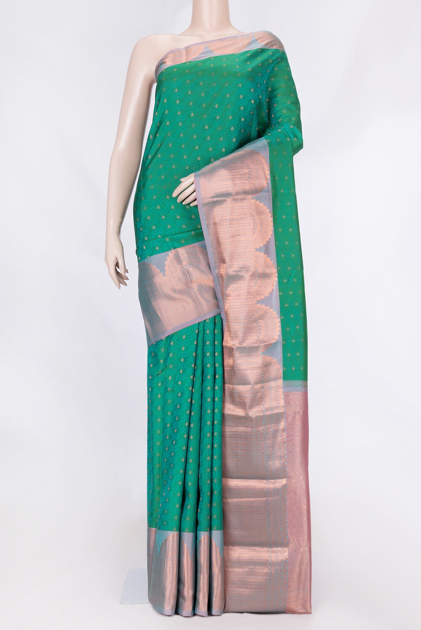 Green Dual Tone Kanchipuram Saree with Zari Butta on the body and Zari Border displayed on a mannequin