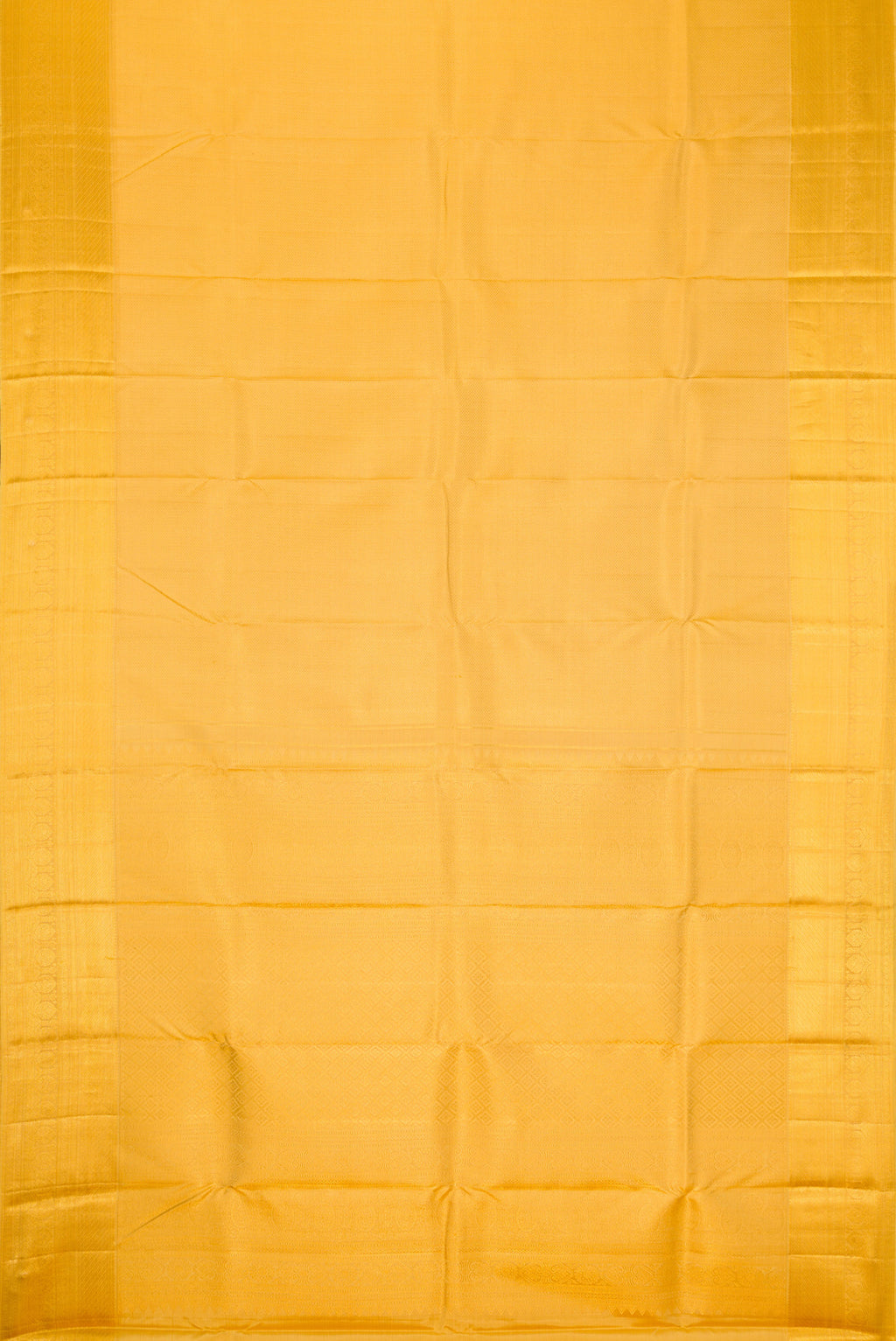 Flat view of Yellow Kanjivaram Silk Saree with Zari Brocade on the body and Zari Border. 
