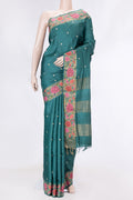Peacock Blue Dual Tone Tussar Saree with Zari Butta on the body and Embroidery Border displayed on a mannequin