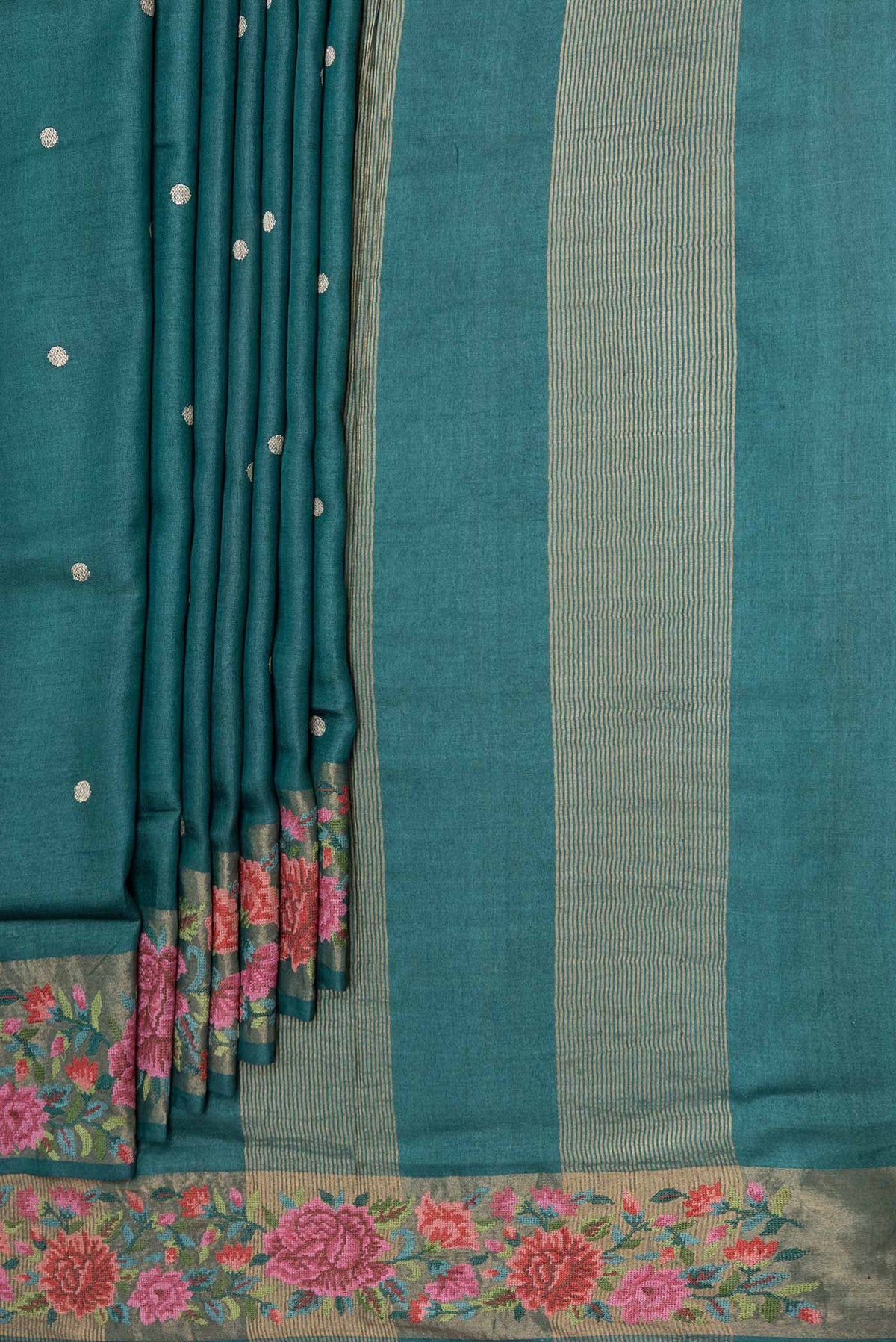 Pleats and pallu of Peacock Blue Dual Tone Tussar Saree with Zari Butta on the body and Embroidery Border