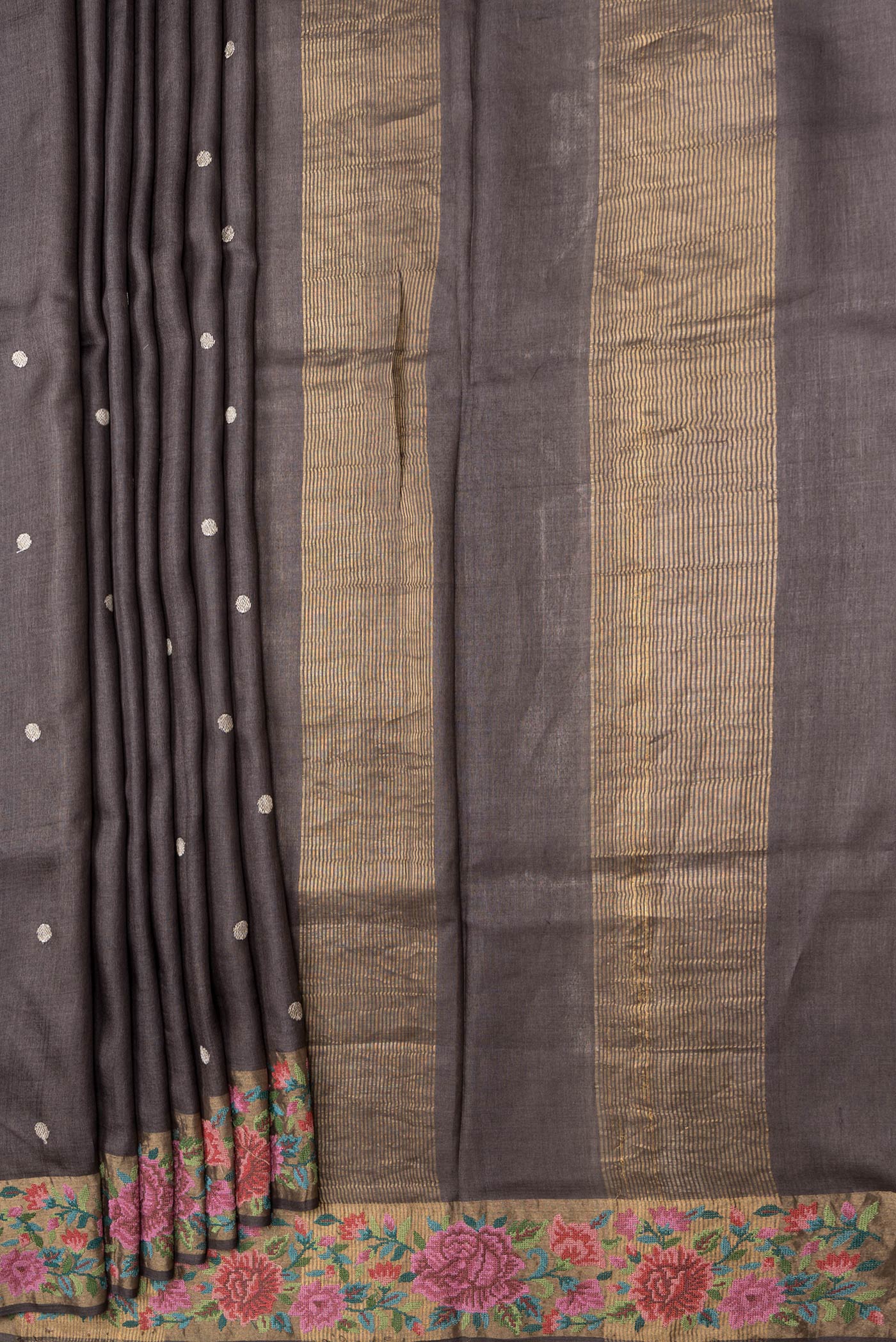 Pleats and pallu of Brown Dual Tone Tussar Silk Saree with Zari Butta on the body and Embroidery Border. 