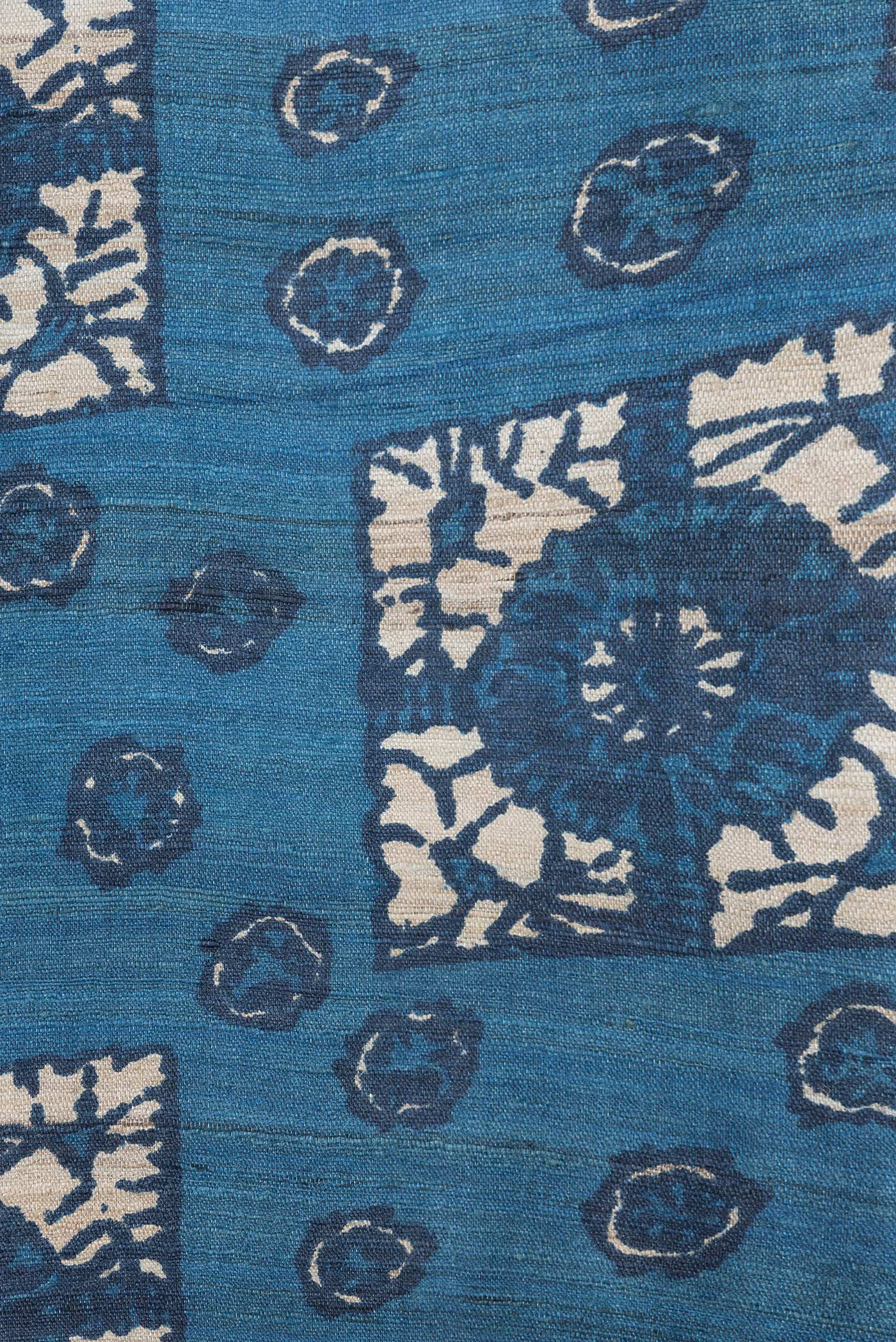 Border image of Blue Dual Tone Tussar Silk Saree with Printed design on the body and Without Border. 