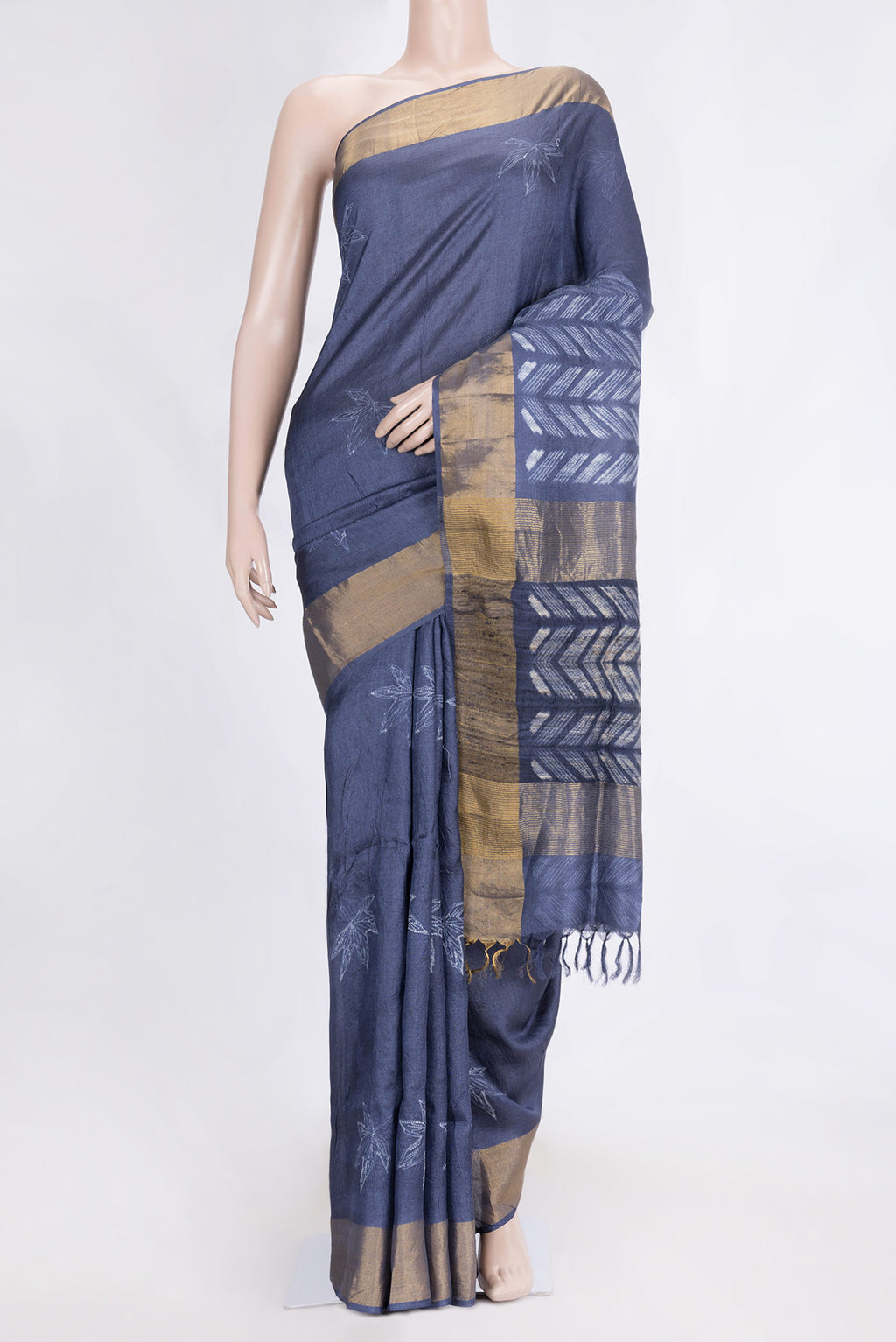 Navy Blue Dual Tone Tussar Saree with Printed design on the body and Zari Border.  displayed on a mannequin