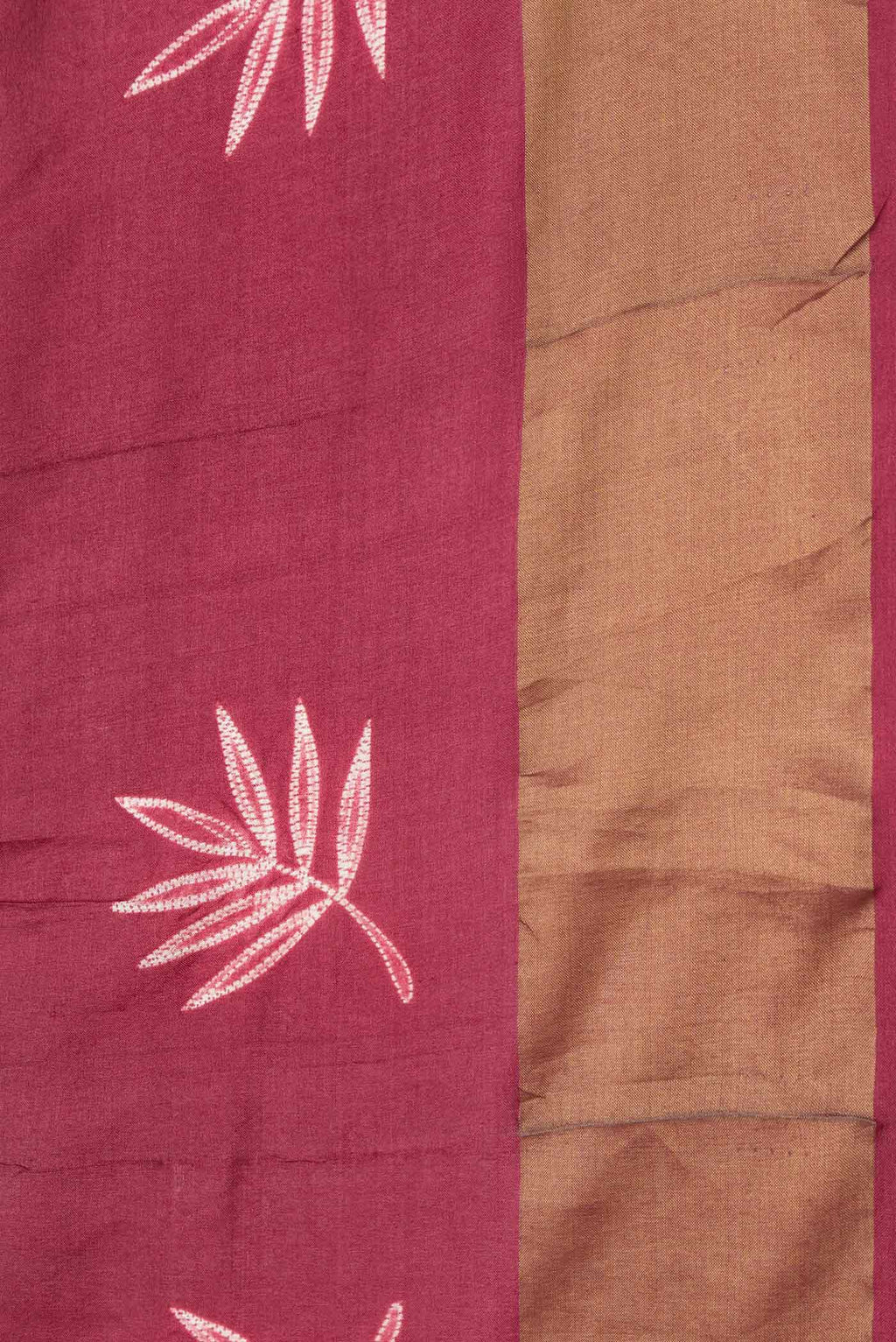 Border image of Maroon Dual Tone Tussar Saree with Printed design on the body and Zari Border. 