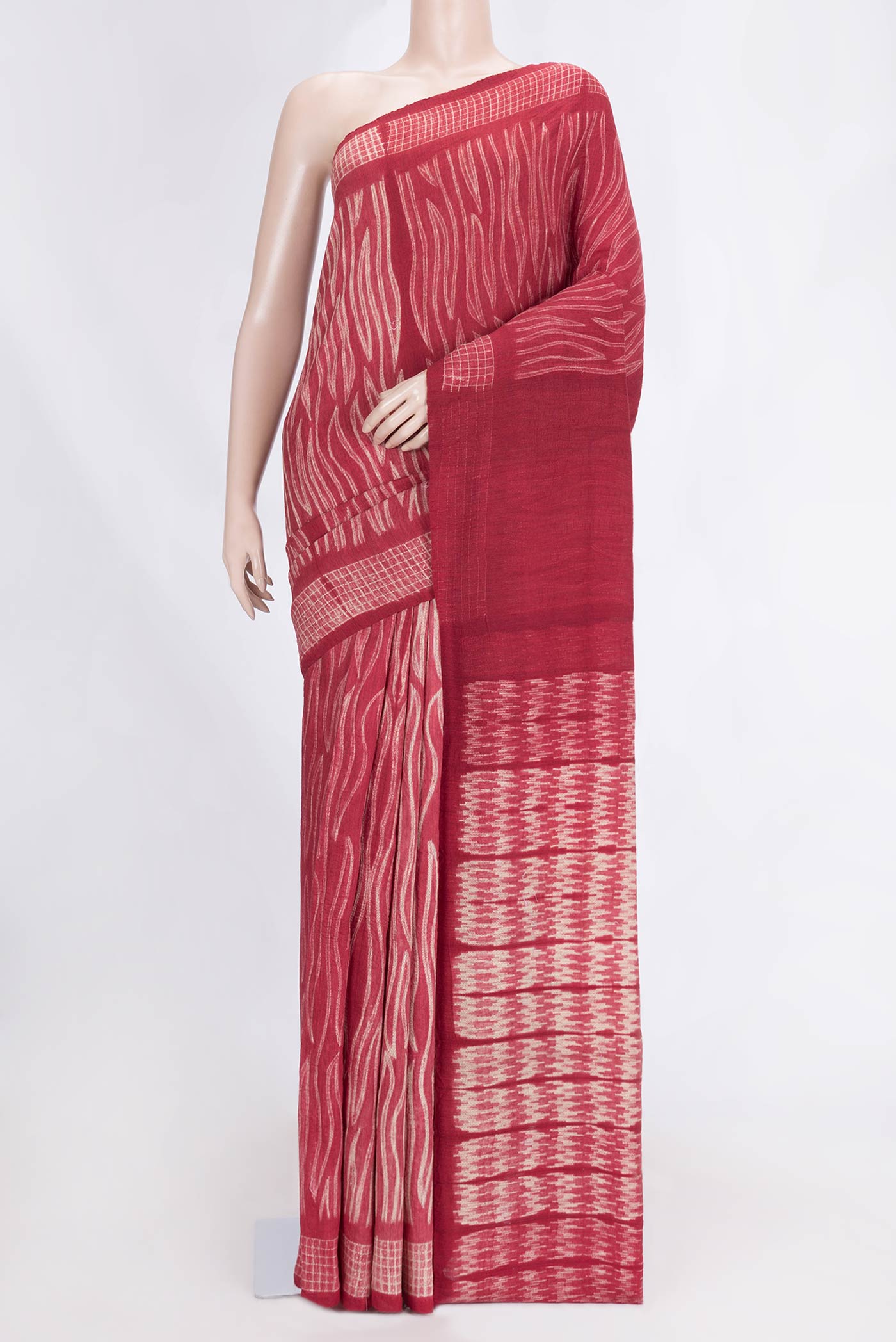 Maroon Dual Tone Tussar Saree with Printed design on the body and Plain Border.  displayed on a mannequin