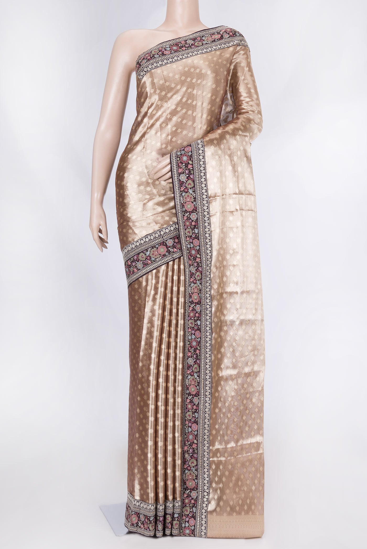 Golden Peach Dual Tone Organza Silk Saree with Zari Brocade on the body and Embroidery Border displayed on a mannequin