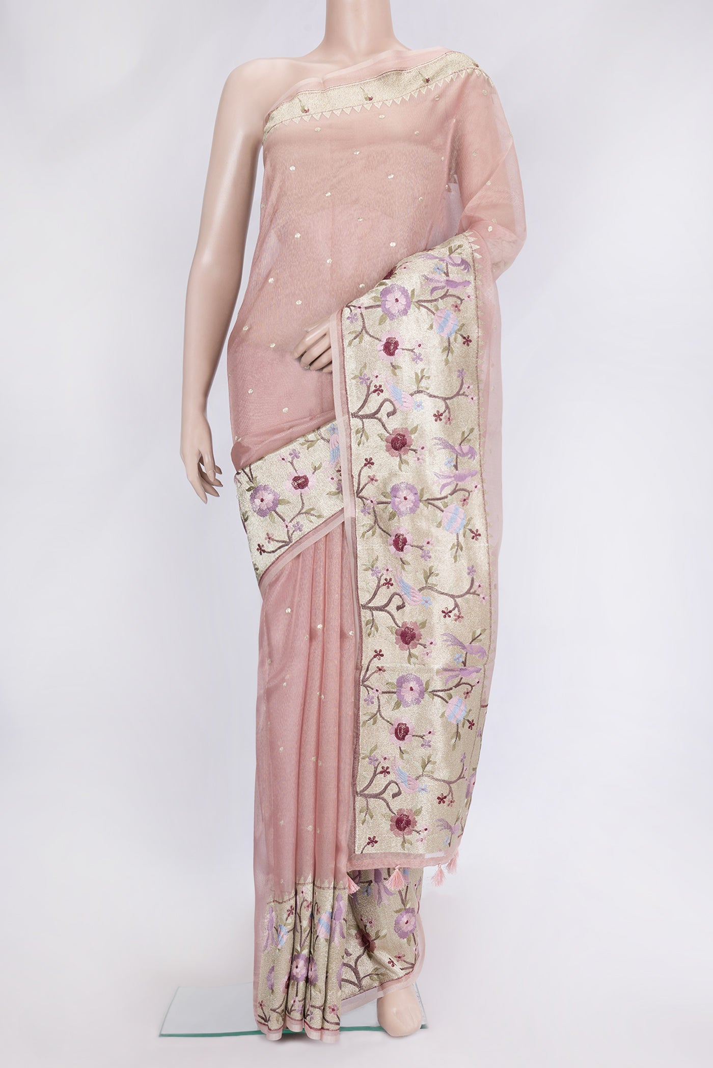 Rose Gold Dual Tone Organza Silk Saree with Zari Butta on the body and Embroidery Border.  displayed on a mannequin