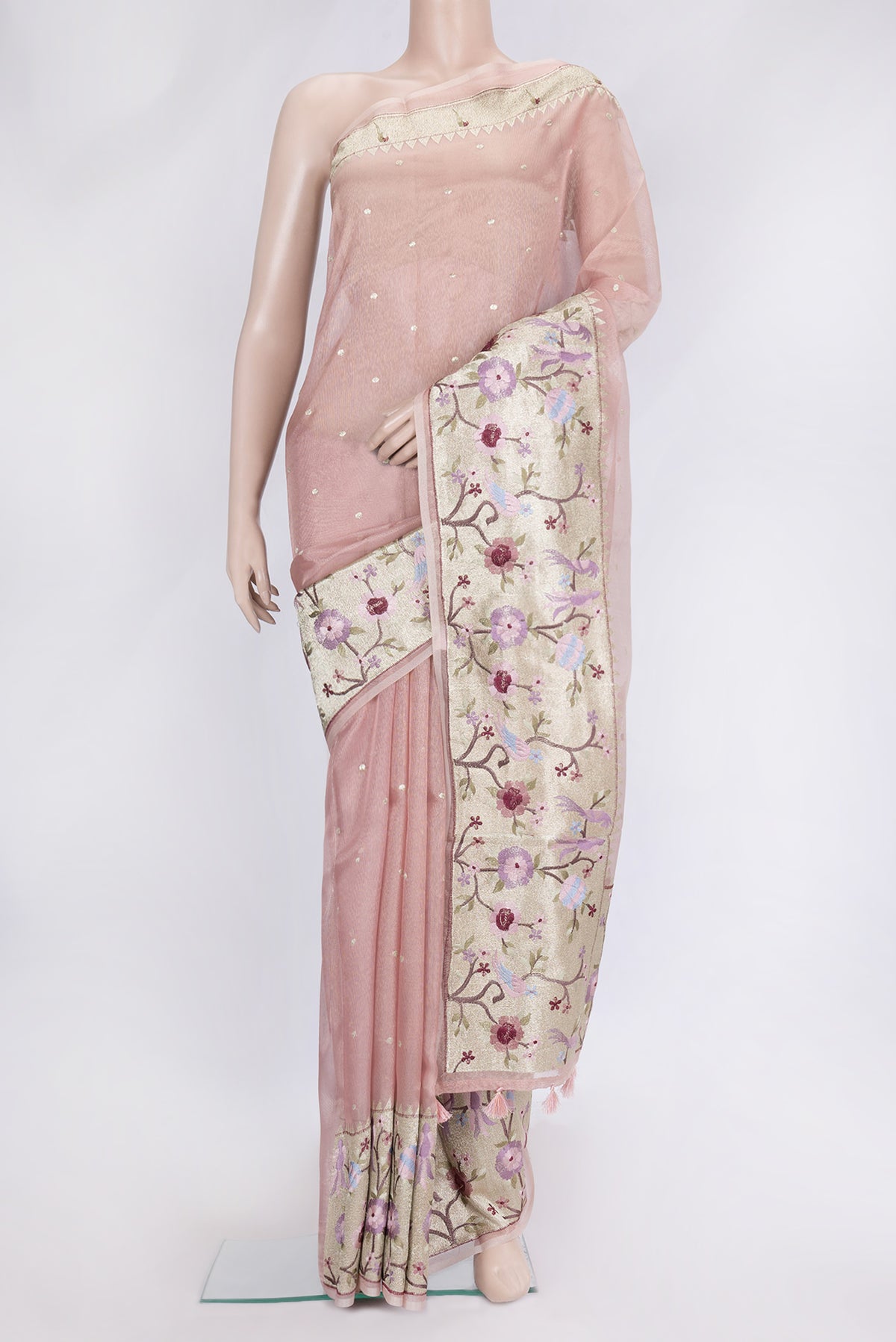 Rose Gold Dual Tone Organza Silk Saree with Zari Butta on the body and Embroidery Border.  displayed on a mannequin