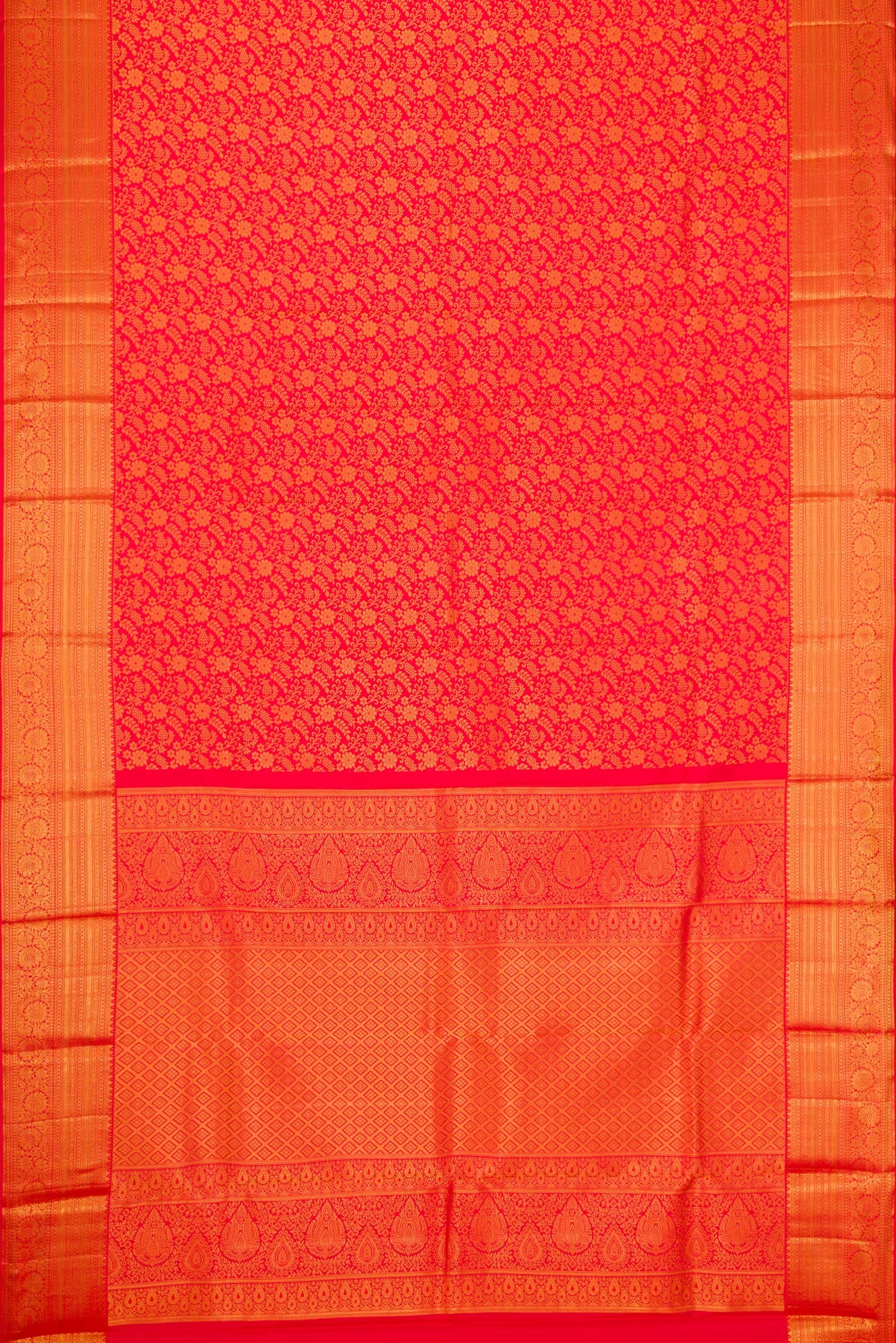 Flat view of Red Dual Tone Kanjivaram Silk Saree with Zari Brocade on the body and Zari Border. 