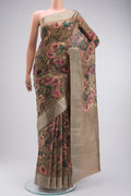 Beige Bhagalpuri Tussar Silk Saree with Printed design on the body and Zari Border displayed on a mannequin