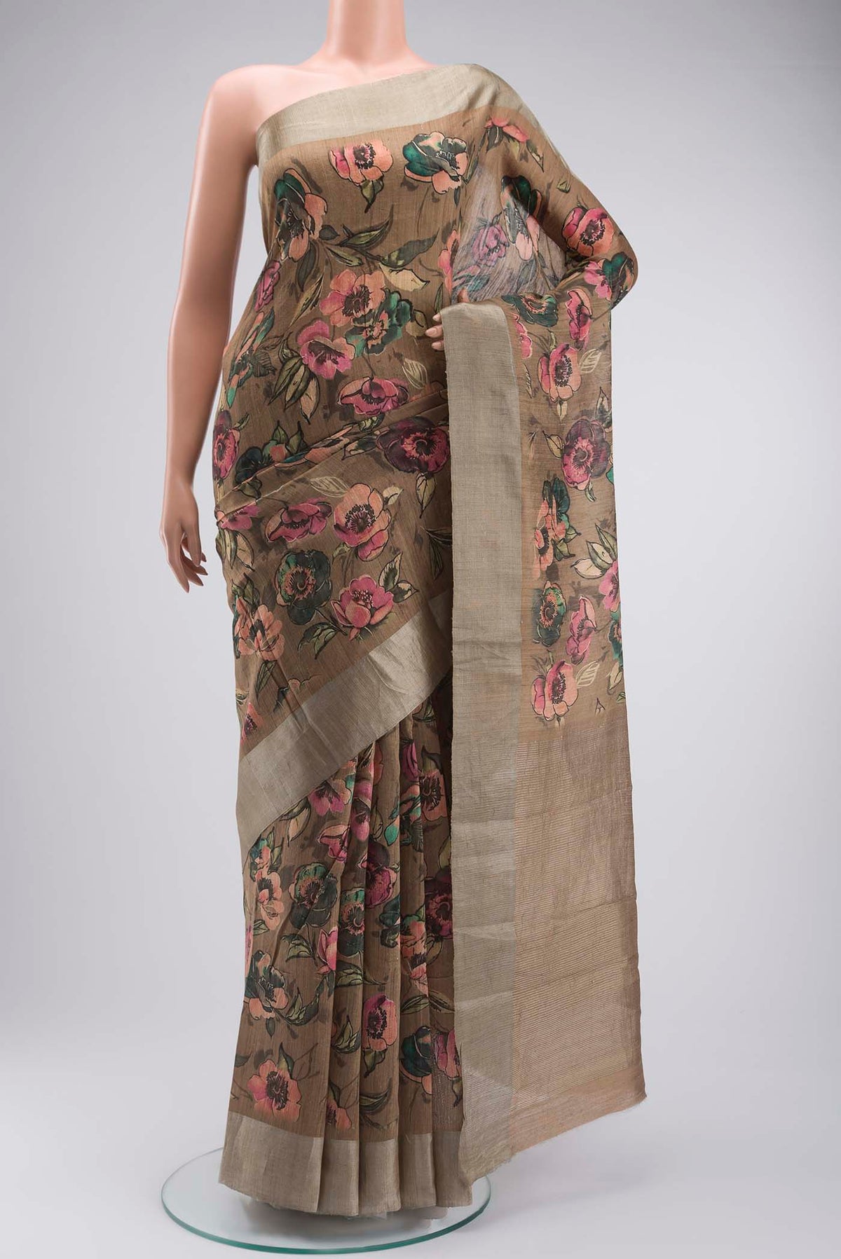 Beige Bhagalpuri Tussar Silk Saree with Printed design on the body and Zari Border displayed on a mannequin
