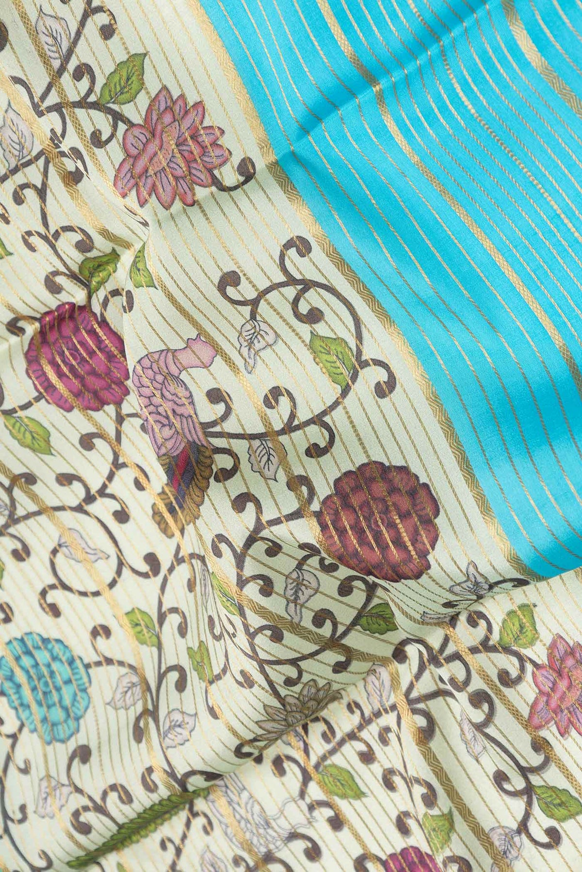 Close up of Sky Blue Dual Tone Mysore Crepe Saree with Stripes on the body and Zari Border displaying folds