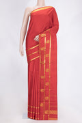 Red Dual Tone Kanchipuram Saree with Plain Body and Zari Border.  displayed on a mannequin