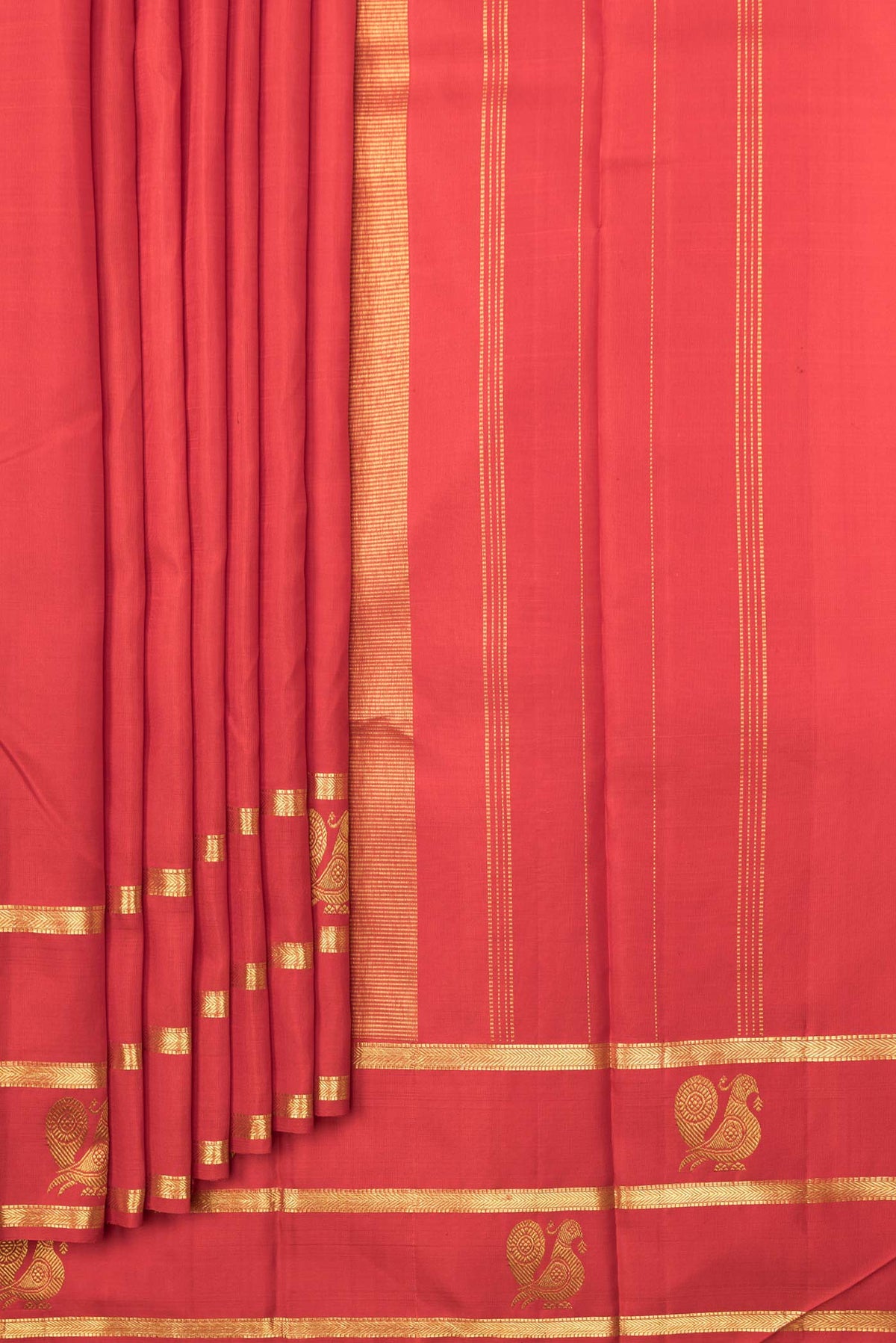 Pleats and pallu of Red Dual Tone Kanchipuram Saree with Plain Body and Zari Border. 